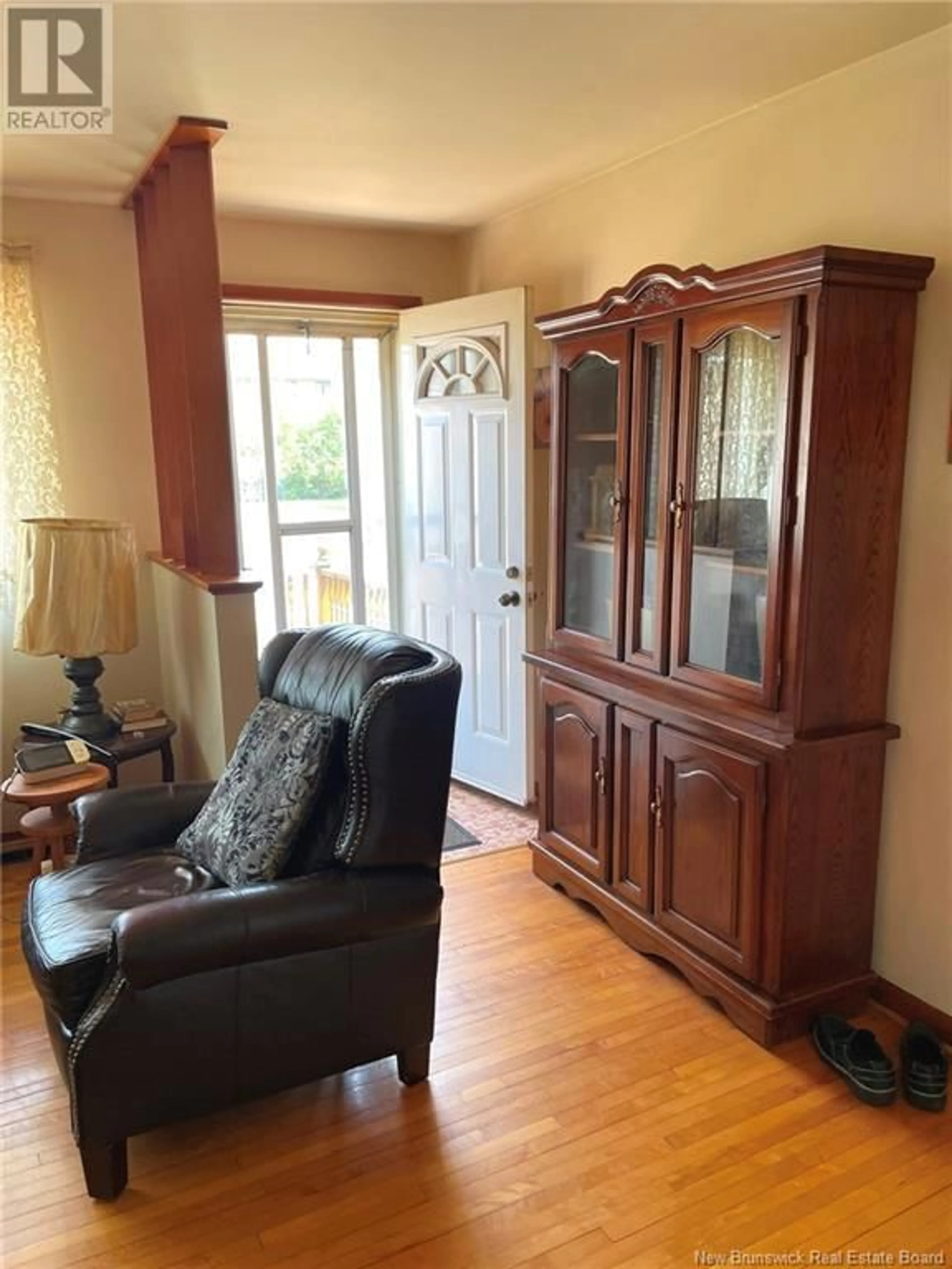 Living room with furniture, wood/laminate floor for 42 ATKINSON, Moncton New Brunswick E1C7S3