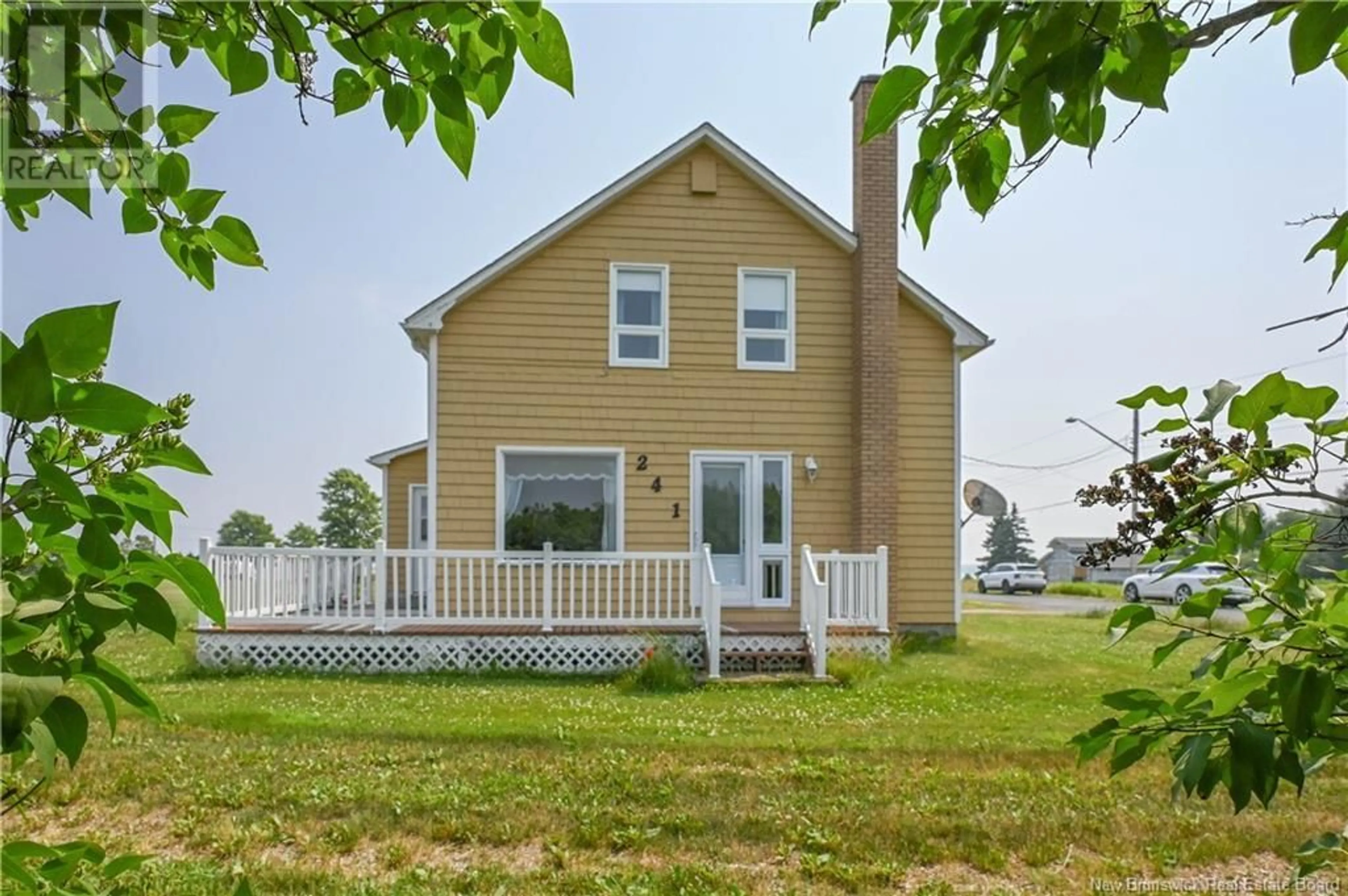 Home with vinyl exterior material, street for 241 POIRIER ROAD, Village-Des-Poirier New Brunswick E8N1N7