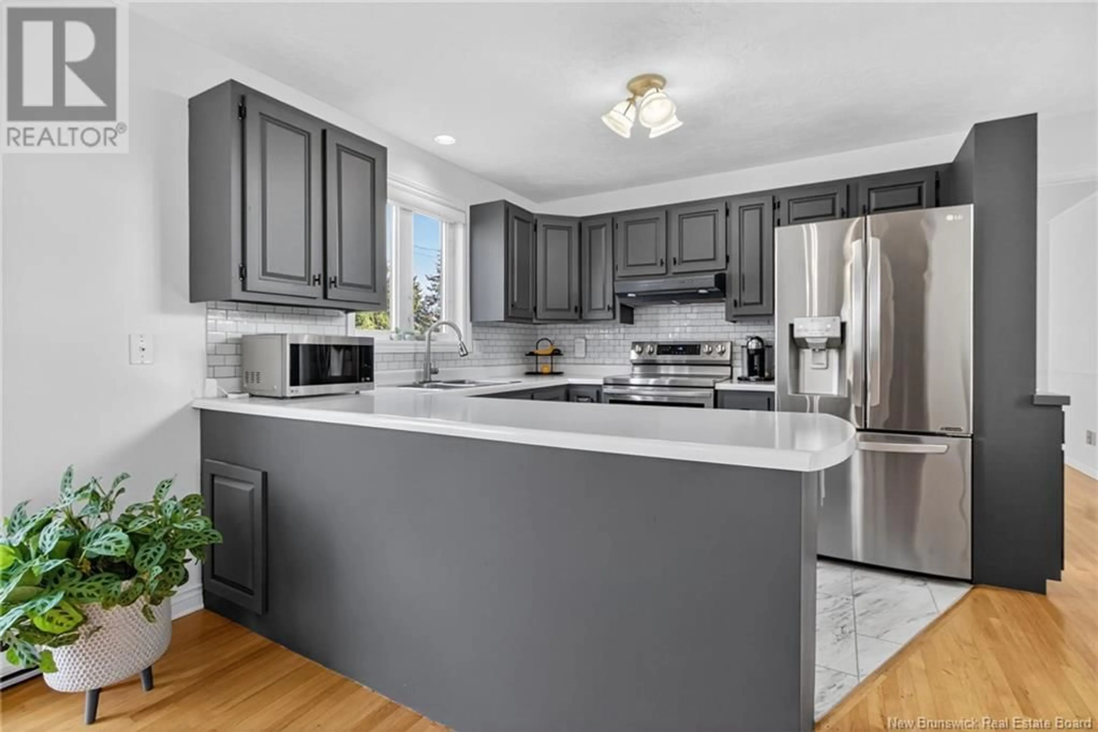 Open concept kitchen, ceramic/tile floor for 290 JEAN DAROIS STREET, Dieppe New Brunswick E1A6B7