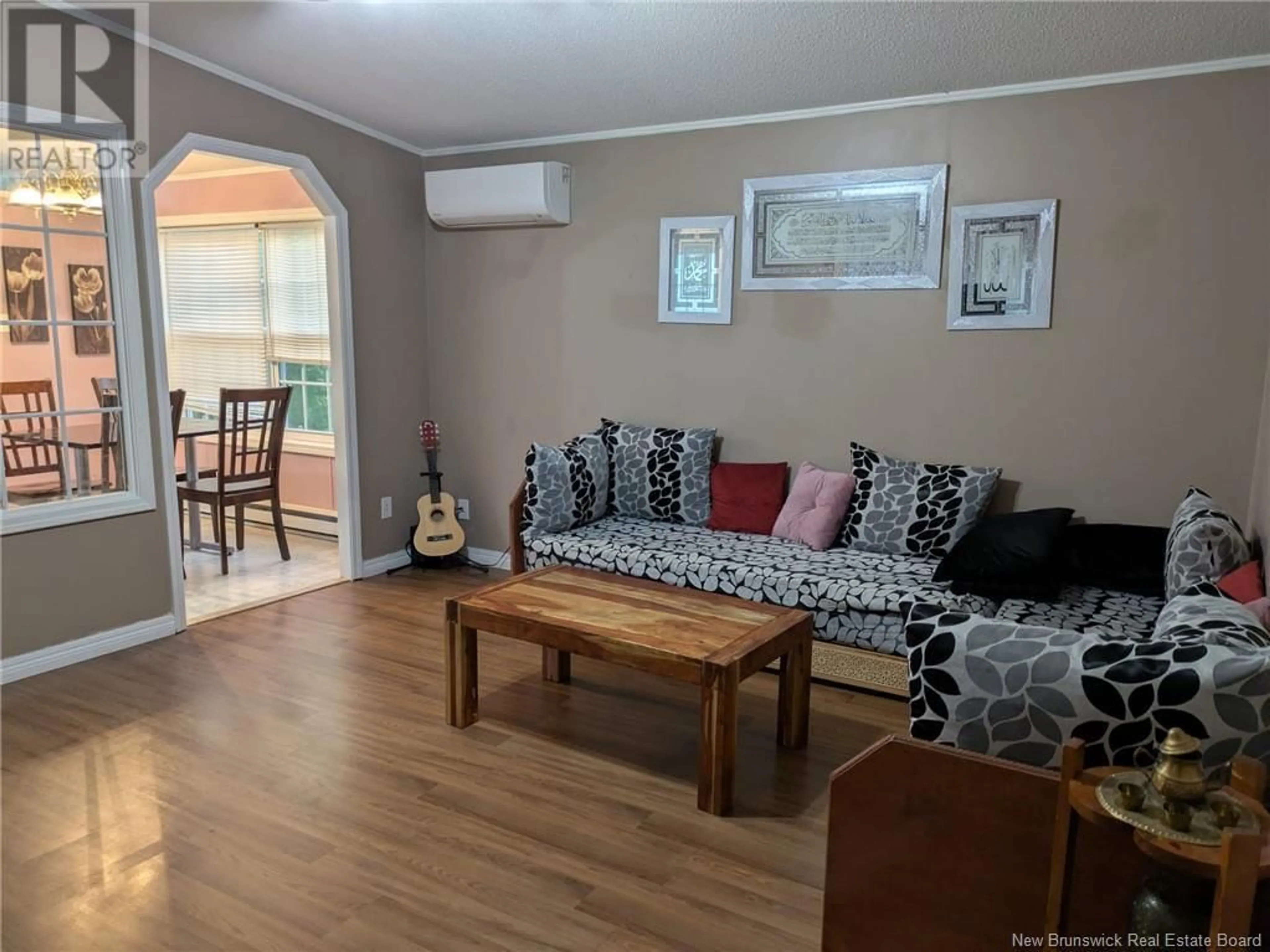 Living room with furniture, wood/laminate floor for 21 RAMSEY STREET, Lincoln New Brunswick E3B6X1