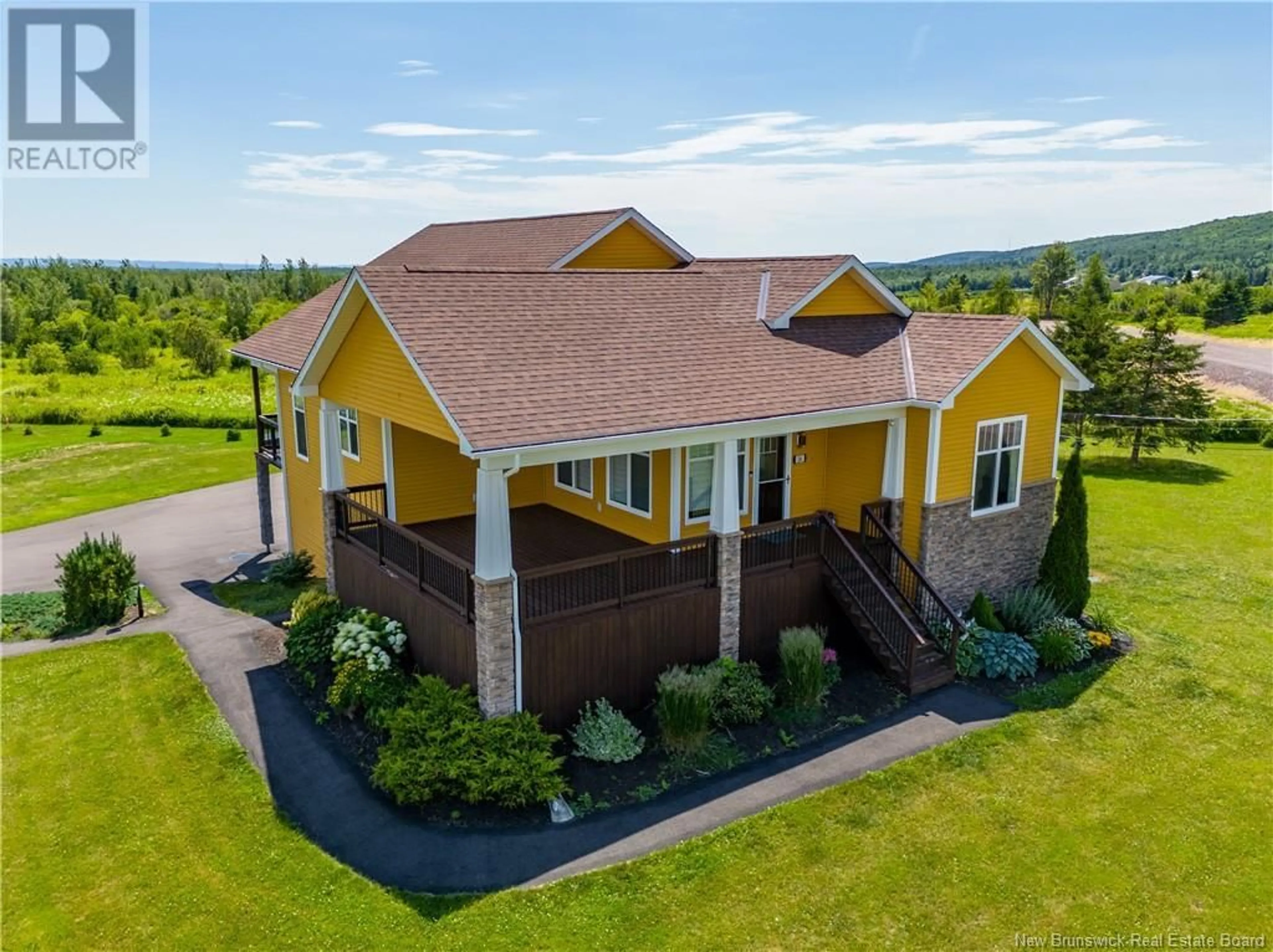 A pic from outside/outdoor area/front of a property/back of a property/a pic from drone, unknown for 24 BRIAR ROSE, Ammon New Brunswick E1G0Y8