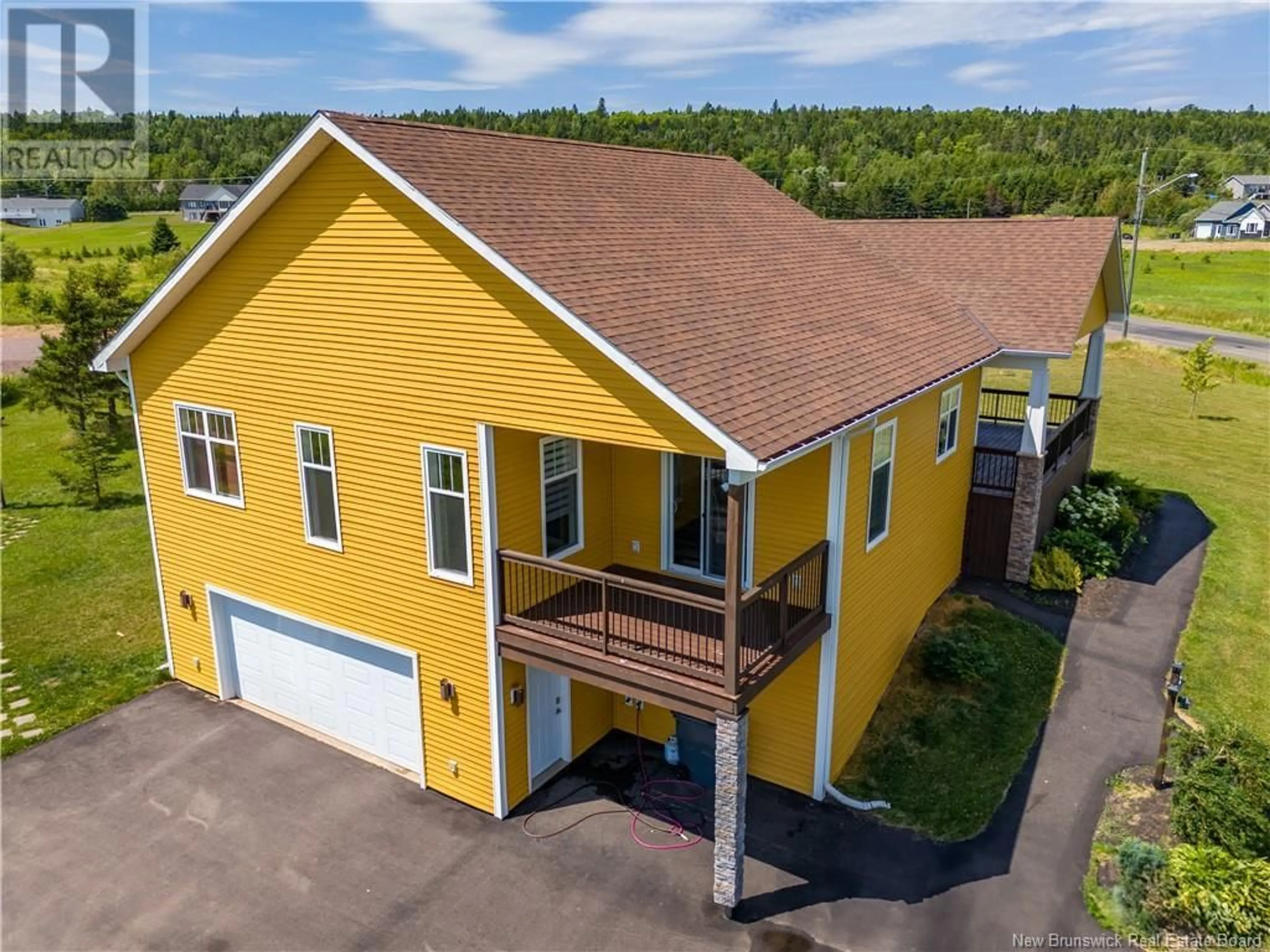 A pic from outside/outdoor area/front of a property/back of a property/a pic from drone, unknown for 24 BRIAR ROSE, Ammon New Brunswick E1G0Y8