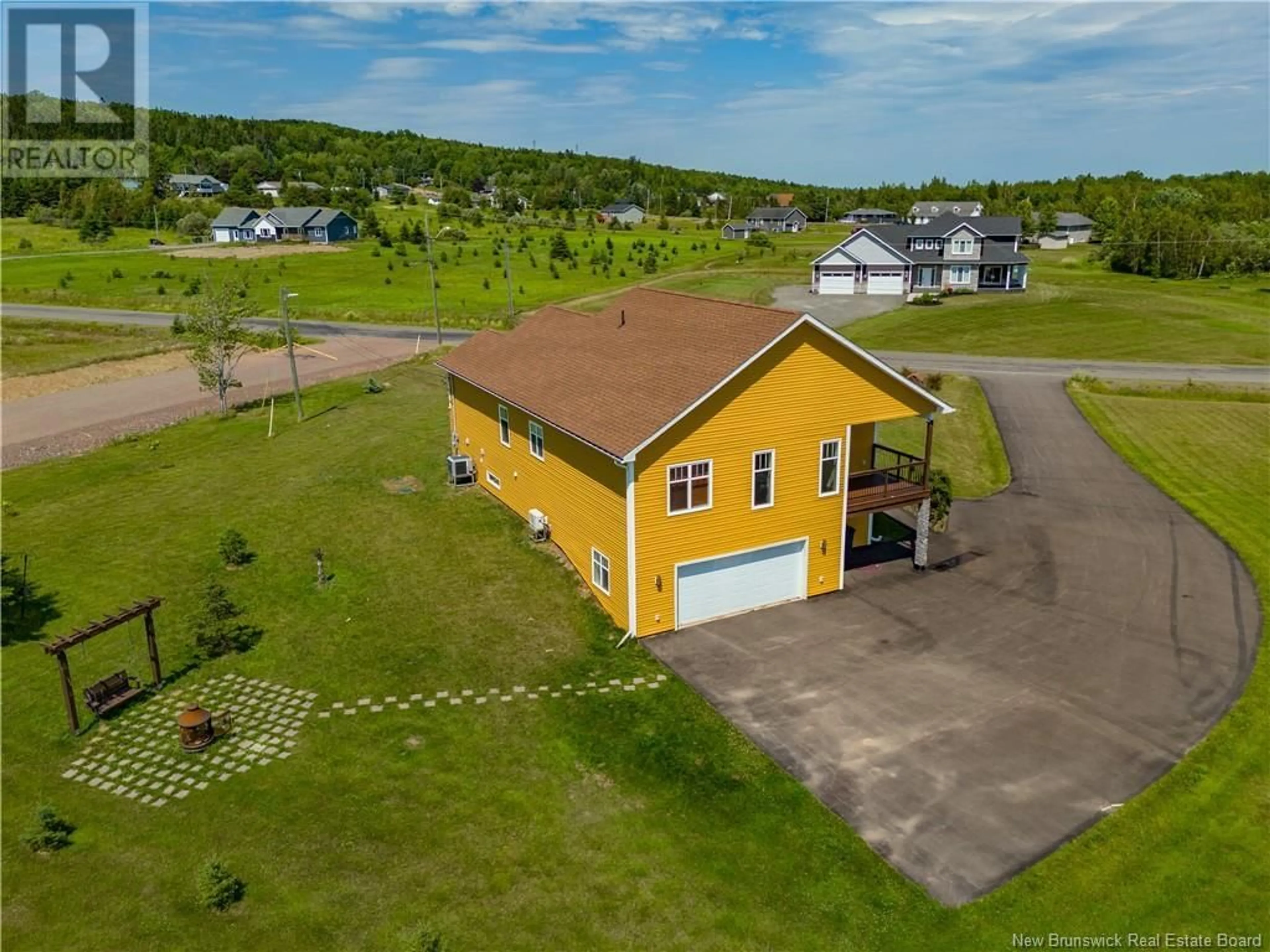 A pic from outside/outdoor area/front of a property/back of a property/a pic from drone, unknown for 24 BRIAR ROSE, Ammon New Brunswick E1G0Y8