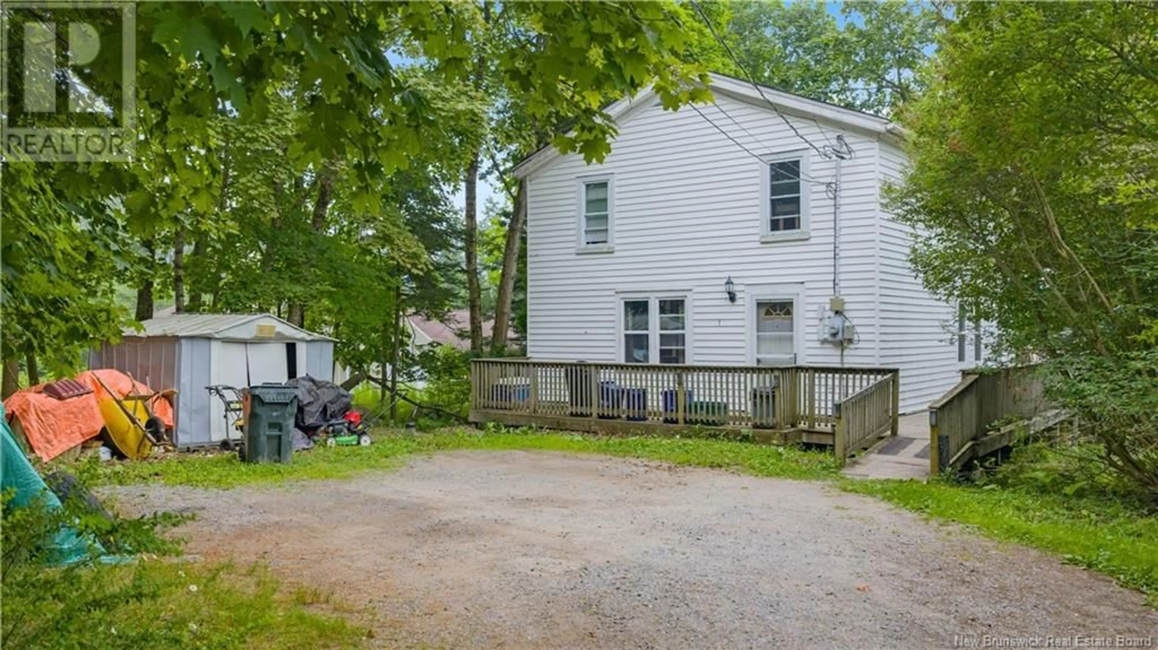 A pic from outside/outdoor area/front of a property/back of a property/a pic from drone, street for 7 RIVER ROAD, Rothesay New Brunswick E2E2C5