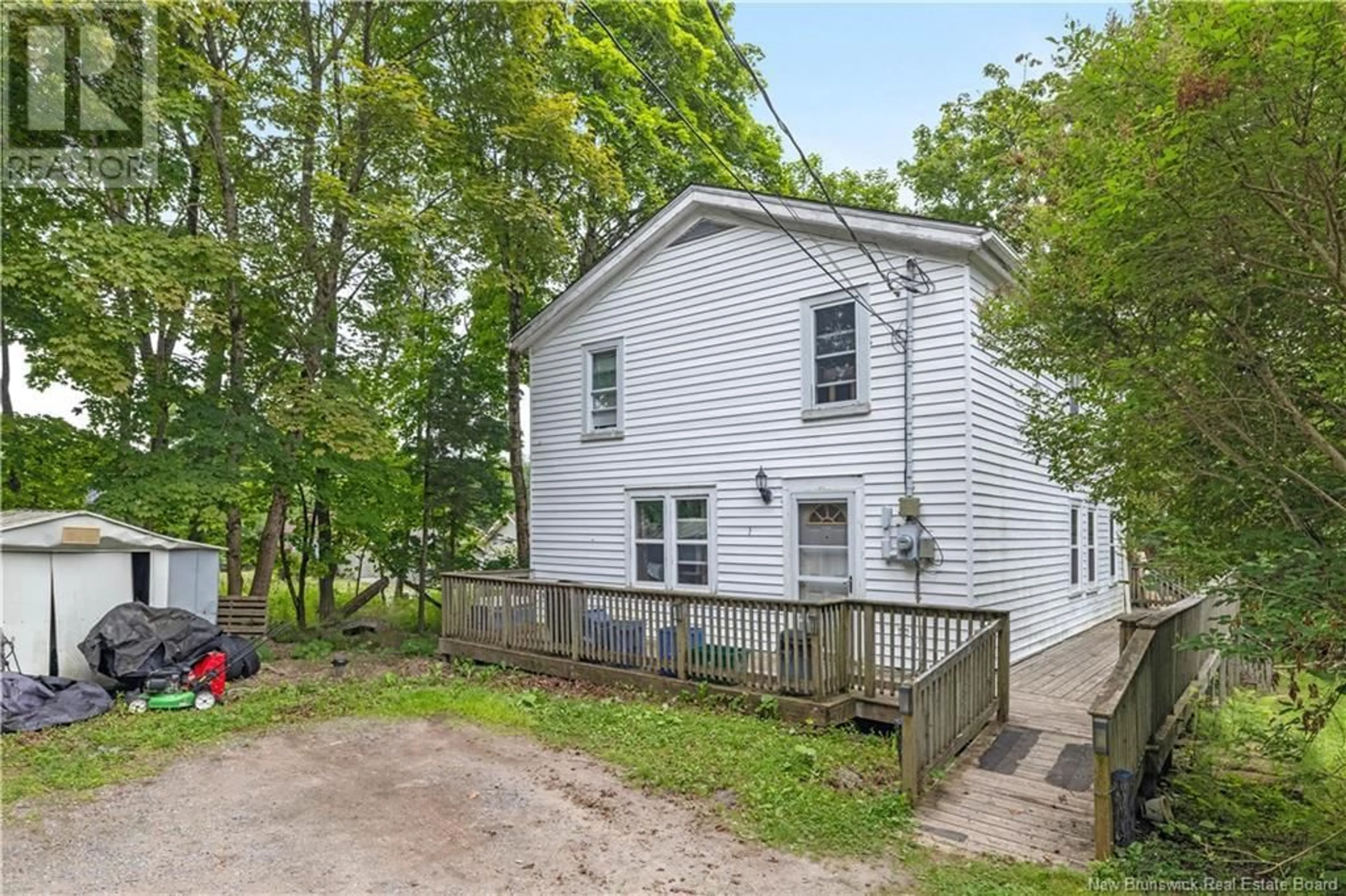 A pic from outside/outdoor area/front of a property/back of a property/a pic from drone, street for 7 RIVER ROAD, Rothesay New Brunswick E2E2C5