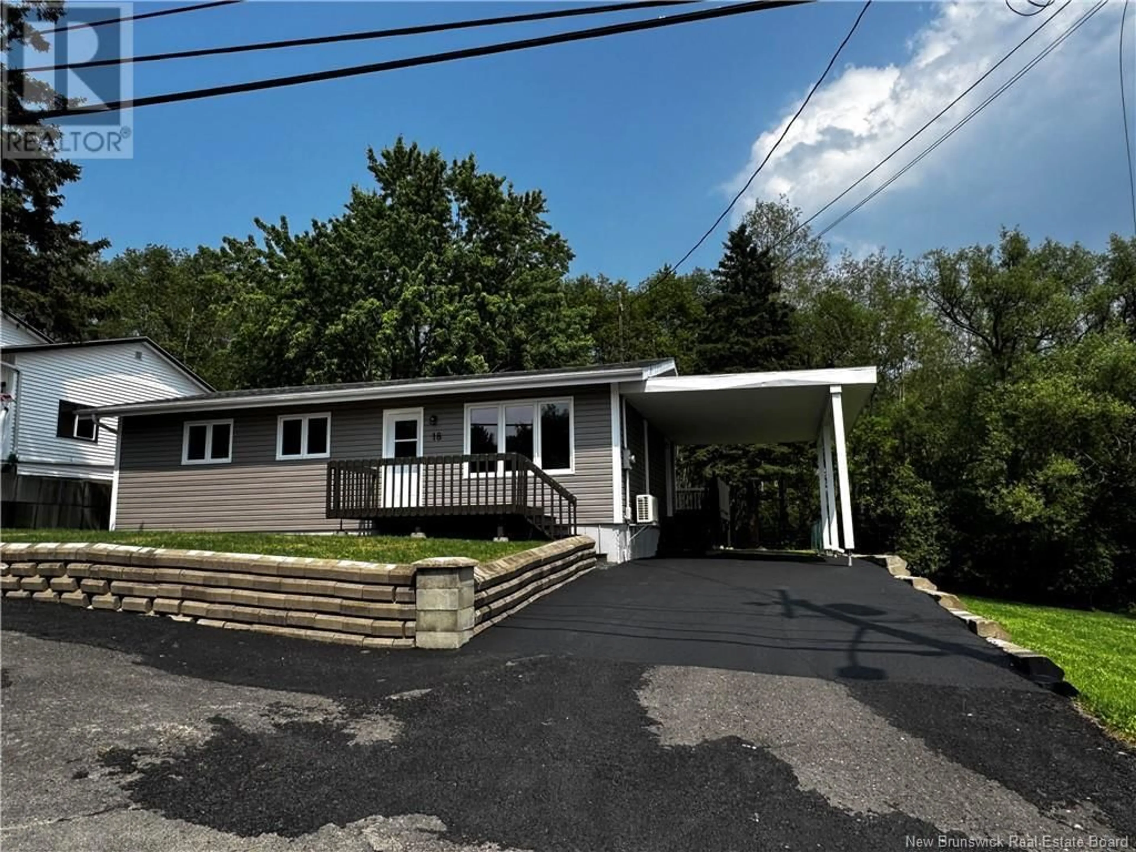 Home with vinyl exterior material, street for 18 MARMEN AVENUE, Edmundston New Brunswick E3V2H2