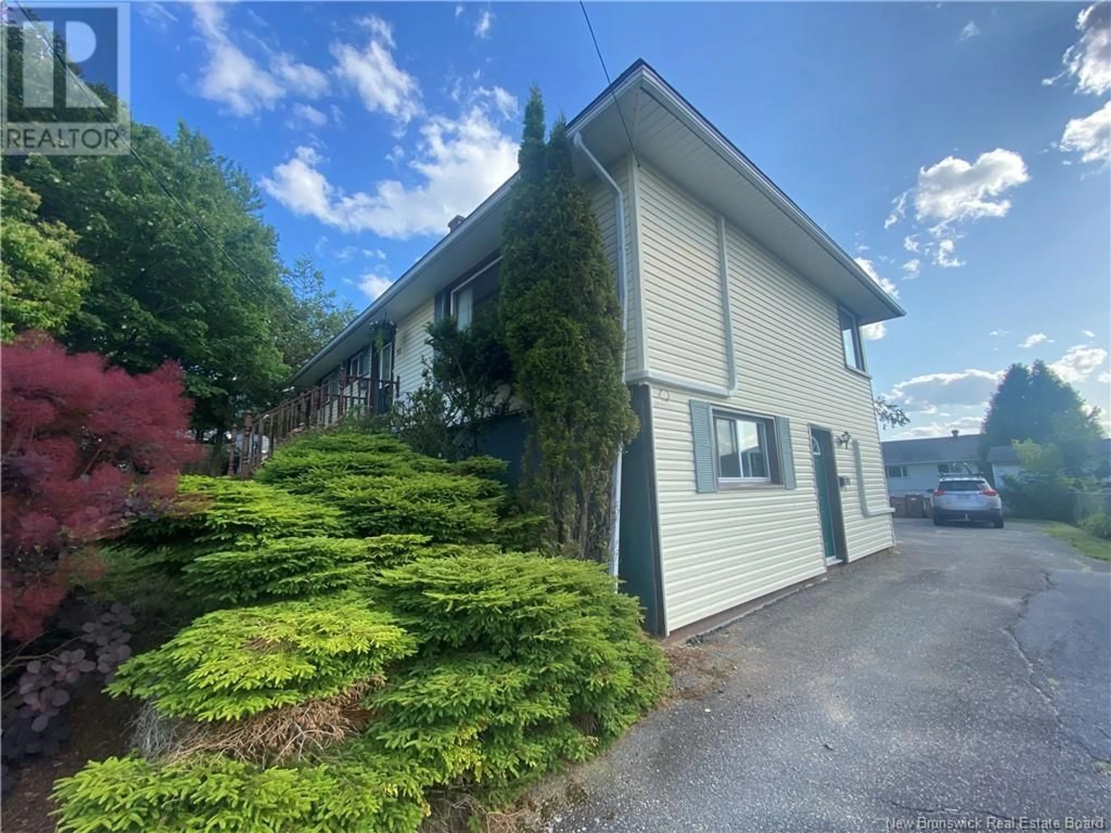A pic from outside/outdoor area/front of a property/back of a property/a pic from drone, street for 55 HARMONY DRIVE, Saint John New Brunswick E2J2W2