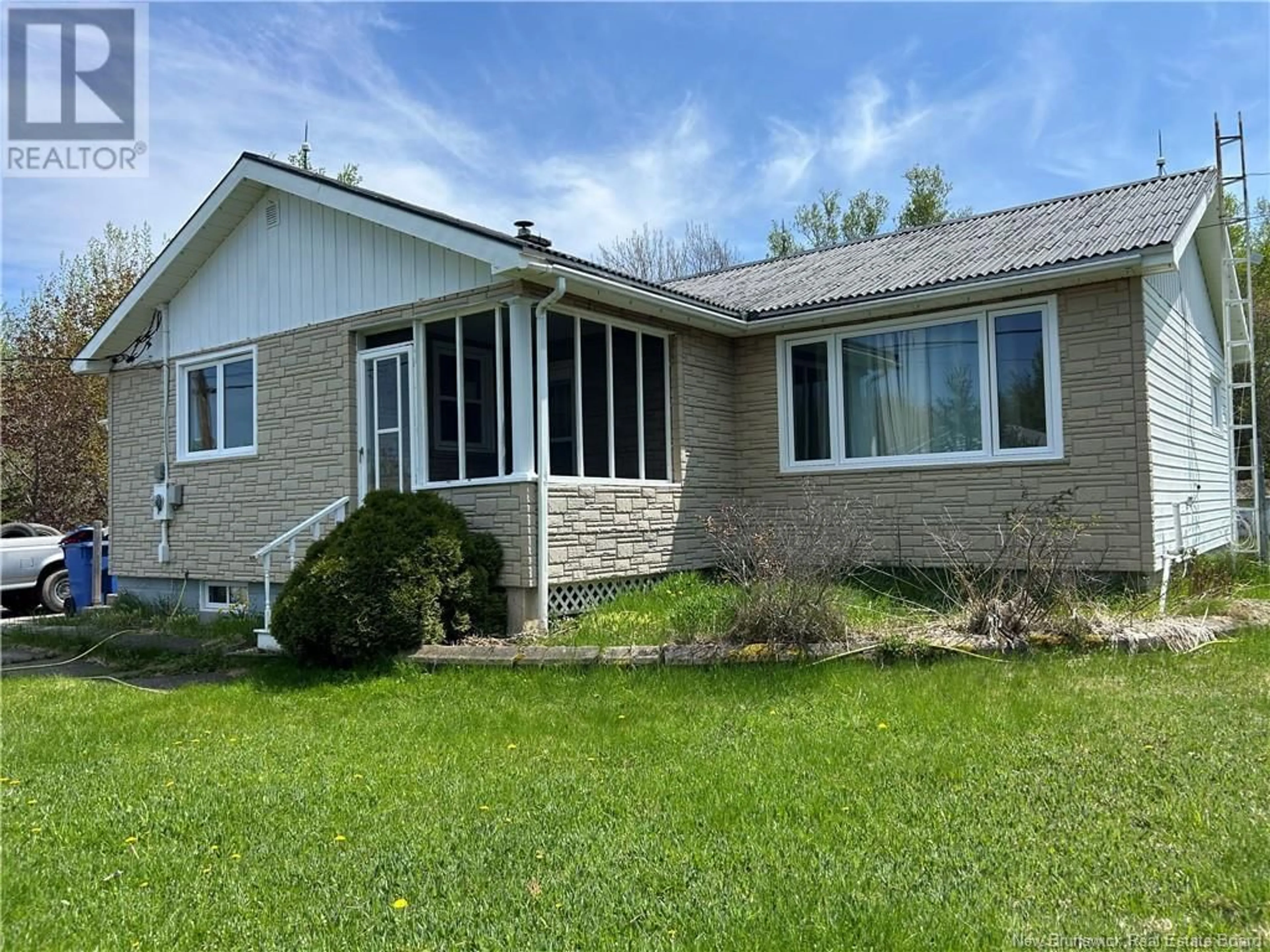 Home with vinyl exterior material, street for 114 LEBOUTHILLIER STREET, Saint-Simon New Brunswick E8P1Z7