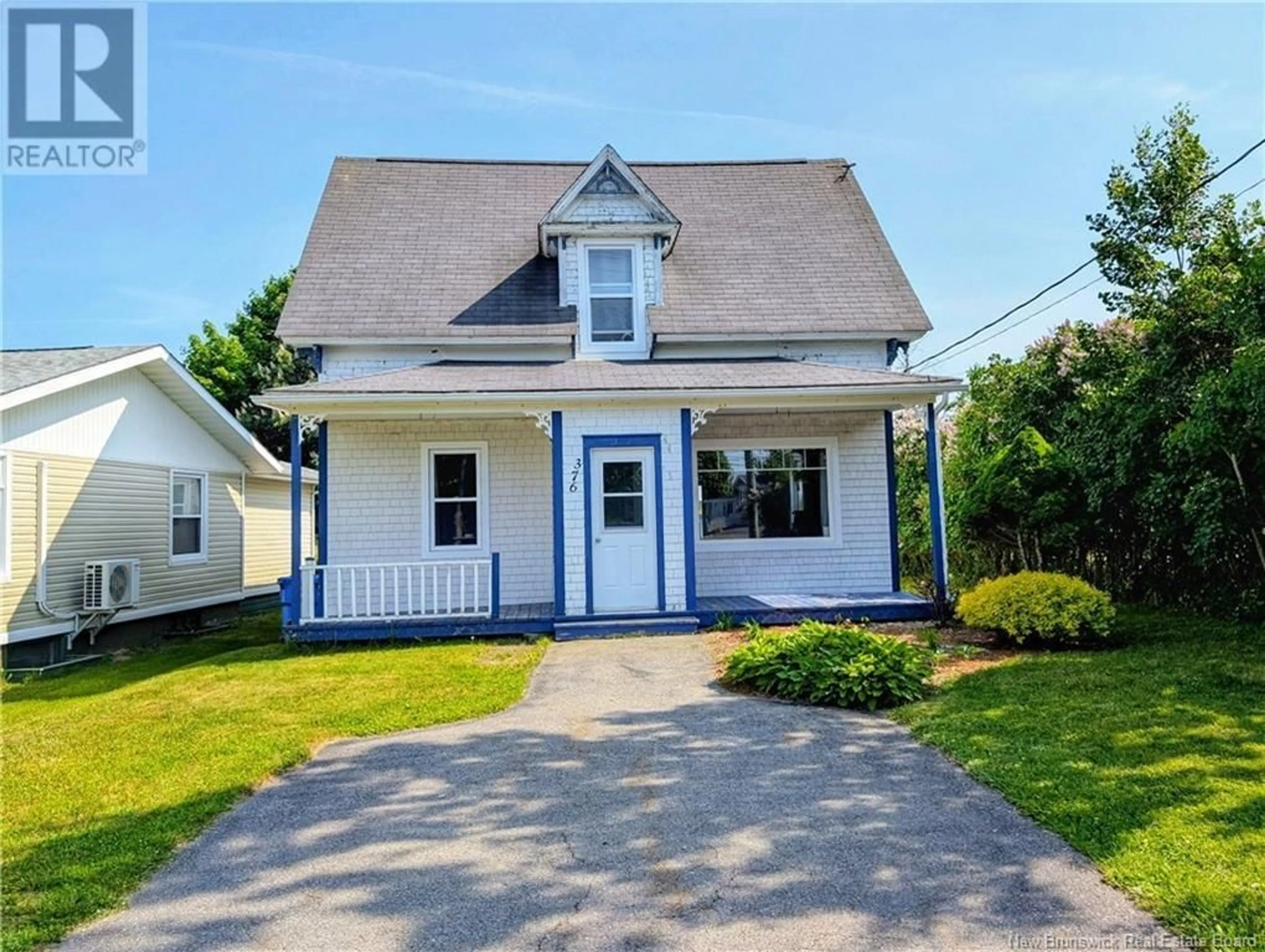 Home with vinyl exterior material, street for 376 ST PIERRE E, Caraquet New Brunswick E1W1B4