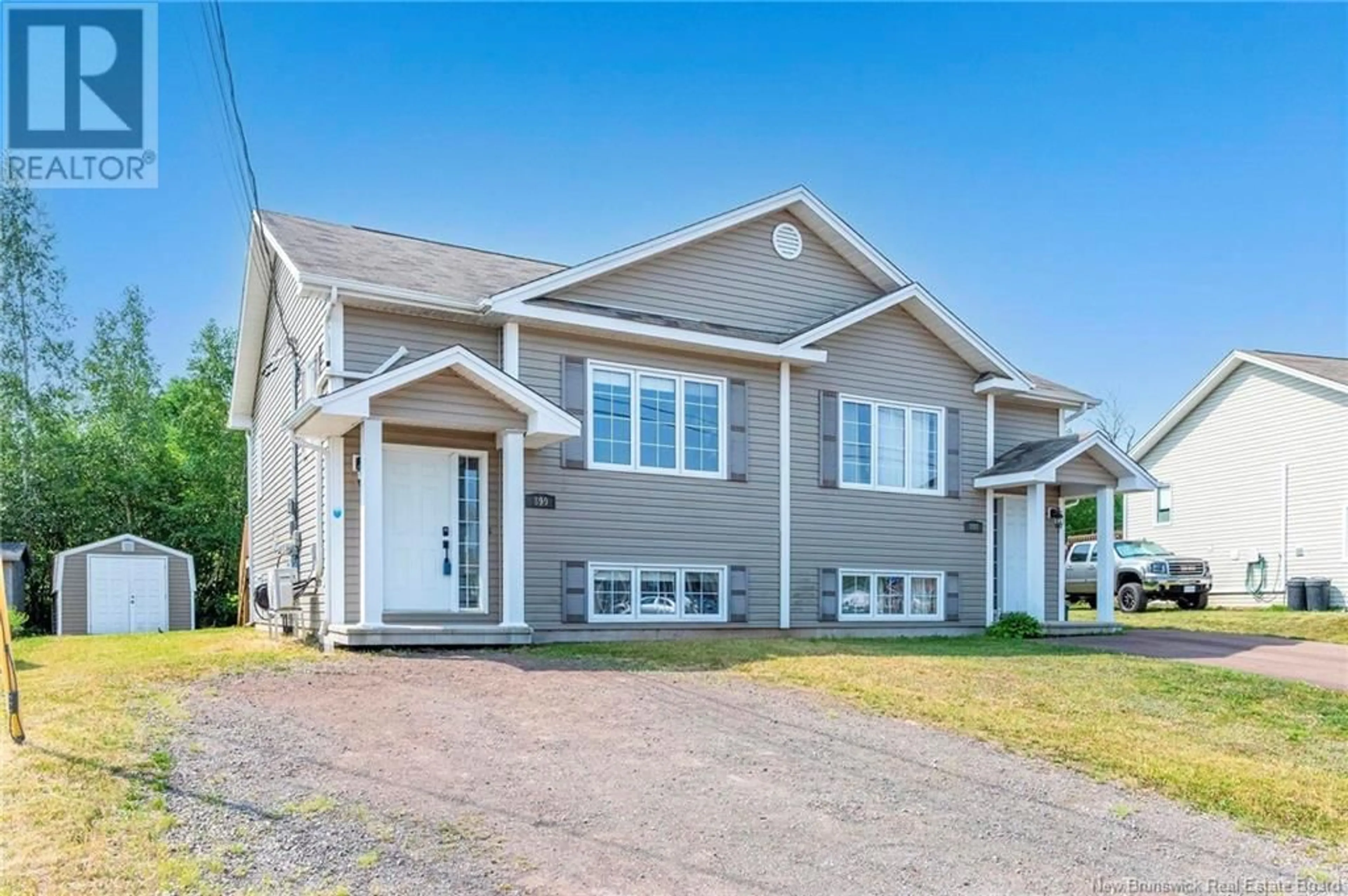 Home with vinyl exterior material, street for 899 BERNARD STREET, Dieppe New Brunswick E1A4A6