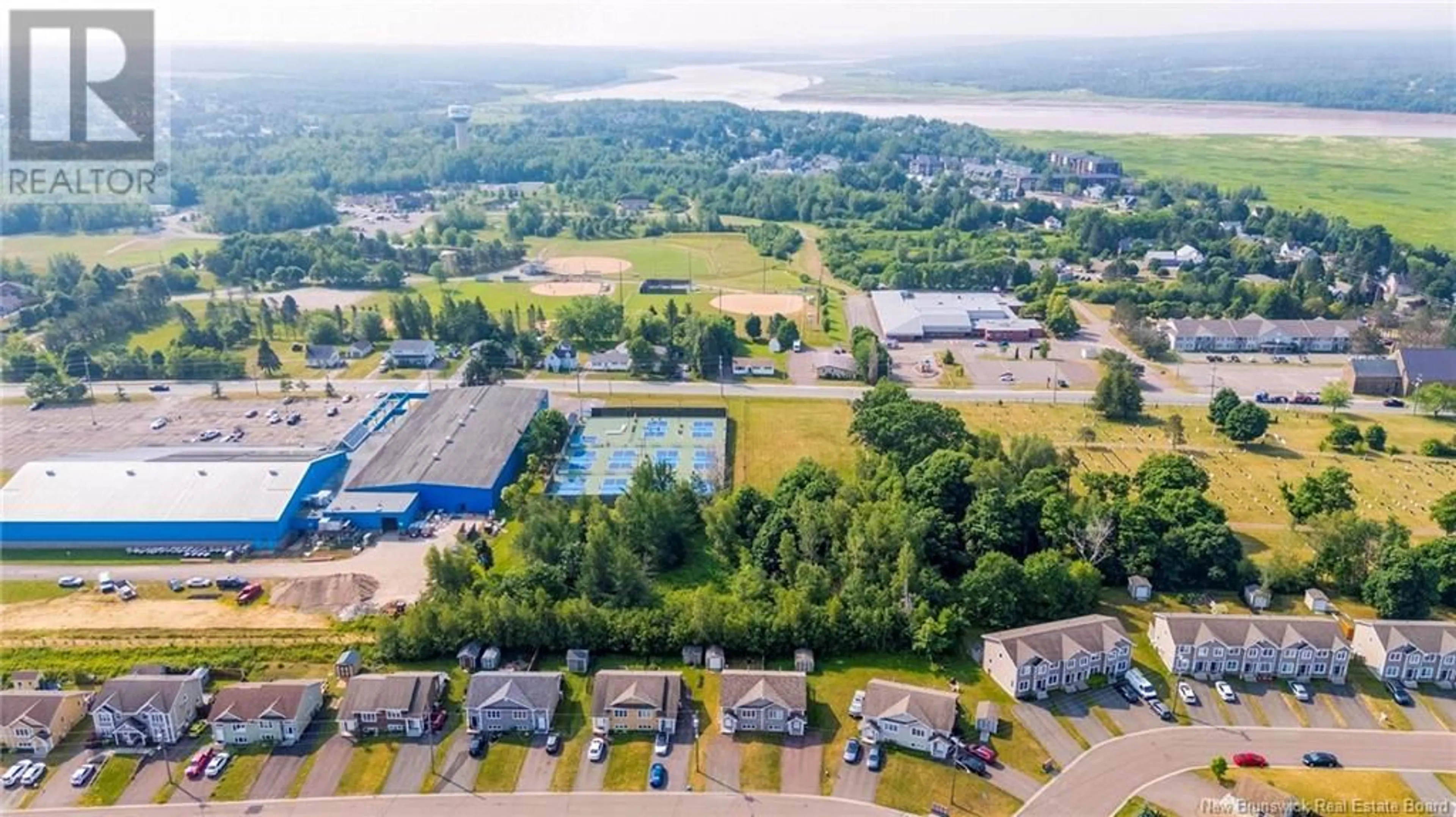 A pic from outside/outdoor area/front of a property/back of a property/a pic from drone, water/lake/river/ocean view for 899 BERNARD STREET, Dieppe New Brunswick E1A4A6