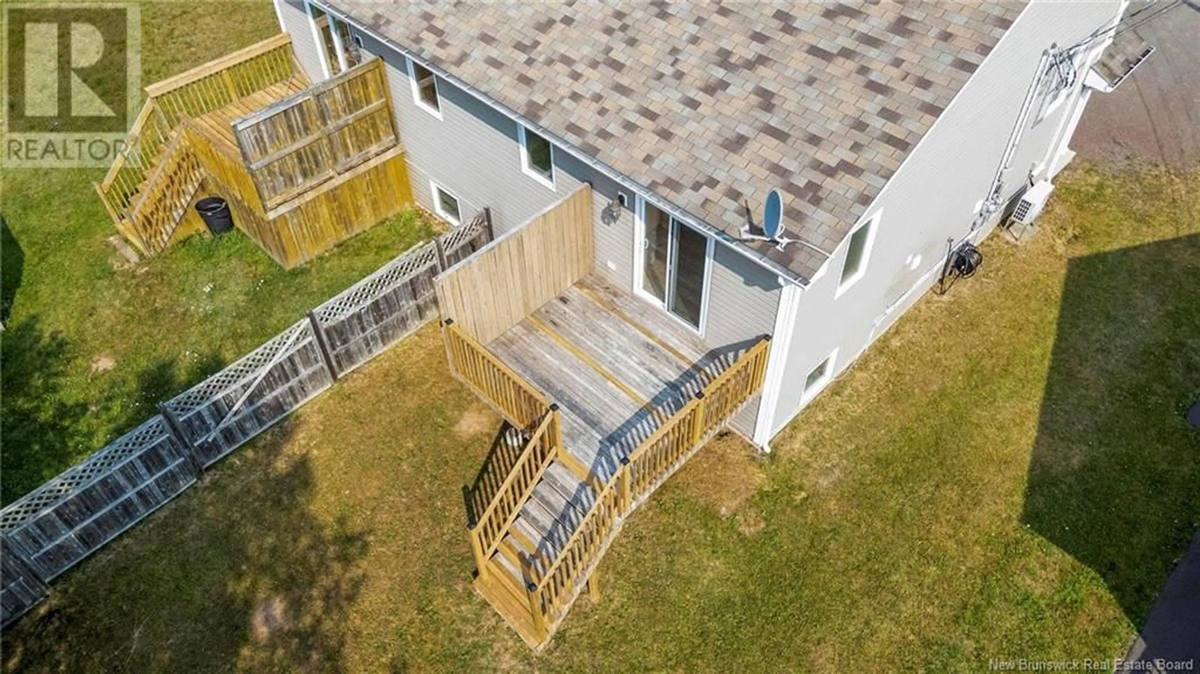 A pic from outside/outdoor area/front of a property/back of a property/a pic from drone, building for 899 BERNARD STREET, Dieppe New Brunswick E1A4A6