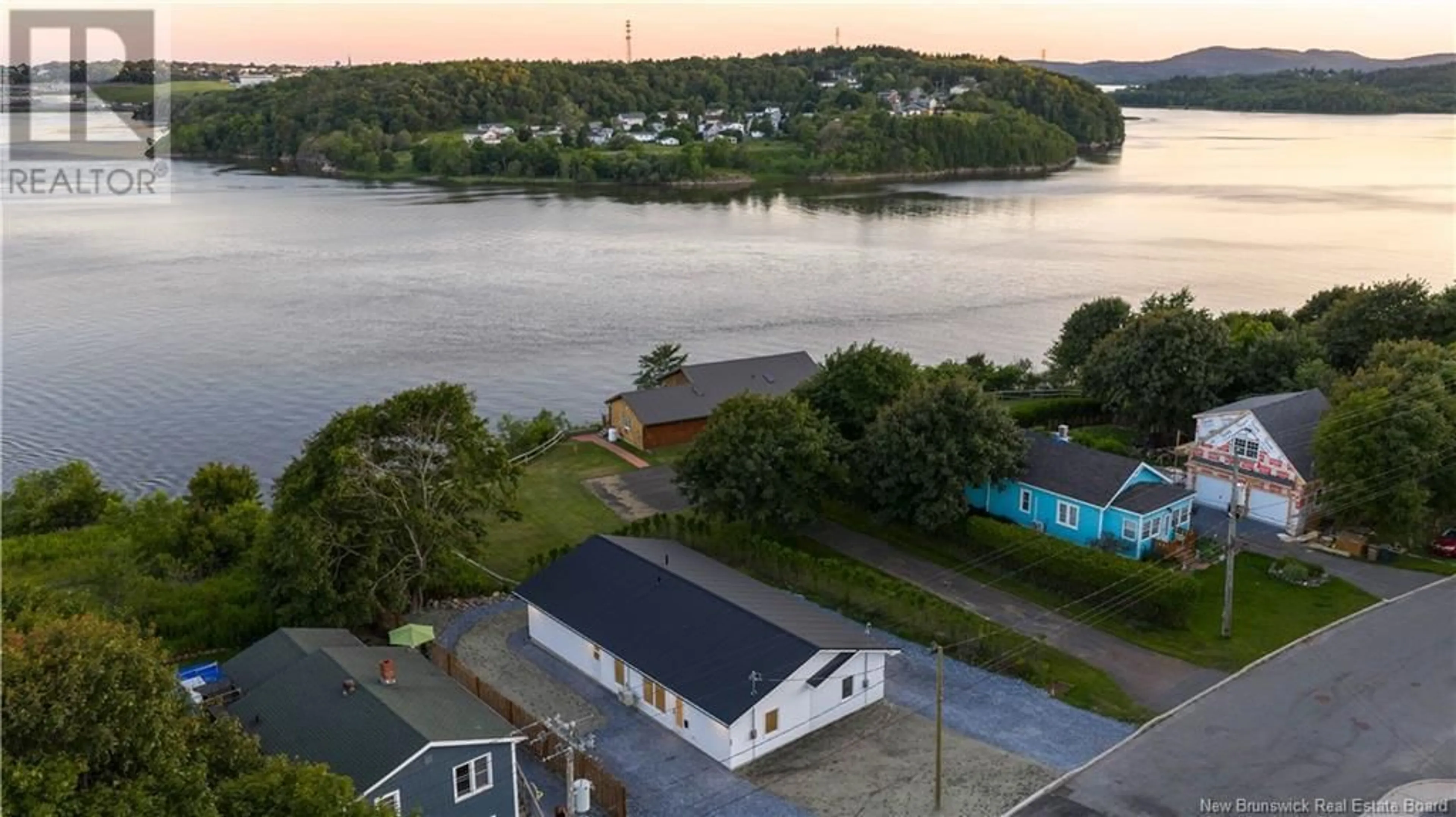 A pic from outside/outdoor area/front of a property/back of a property/a pic from drone, water/lake/river/ocean view for 71 POKIOK ROAD, Saint John New Brunswick E2K1P7