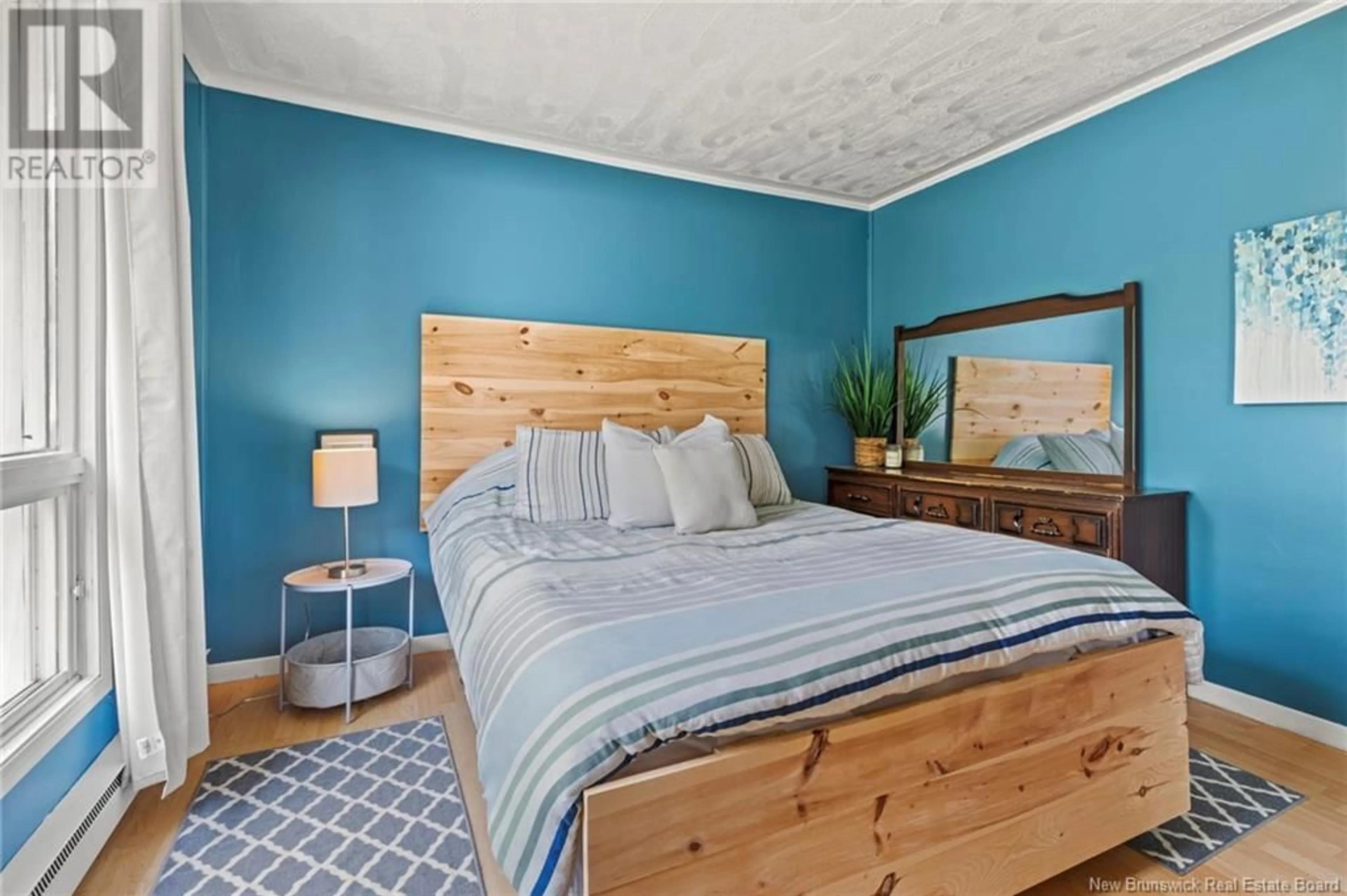Bedroom with bed, wood/laminate floor for 10 MARINE DRIVE, Cumberland Bay New Brunswick E4A3L9