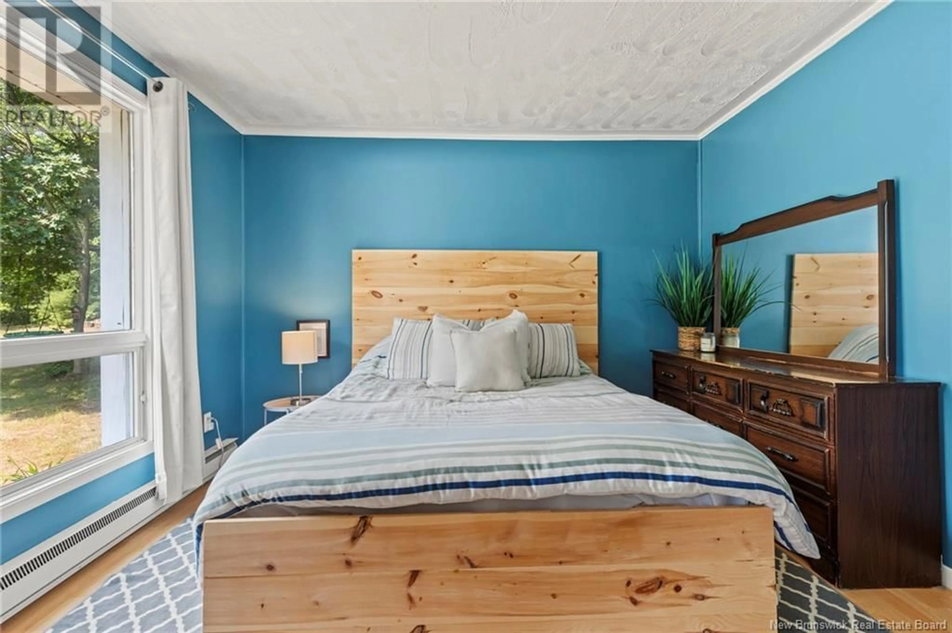 Bedroom with bed, wood/laminate floor for 10 MARINE DRIVE, Cumberland Bay New Brunswick E4A3L9