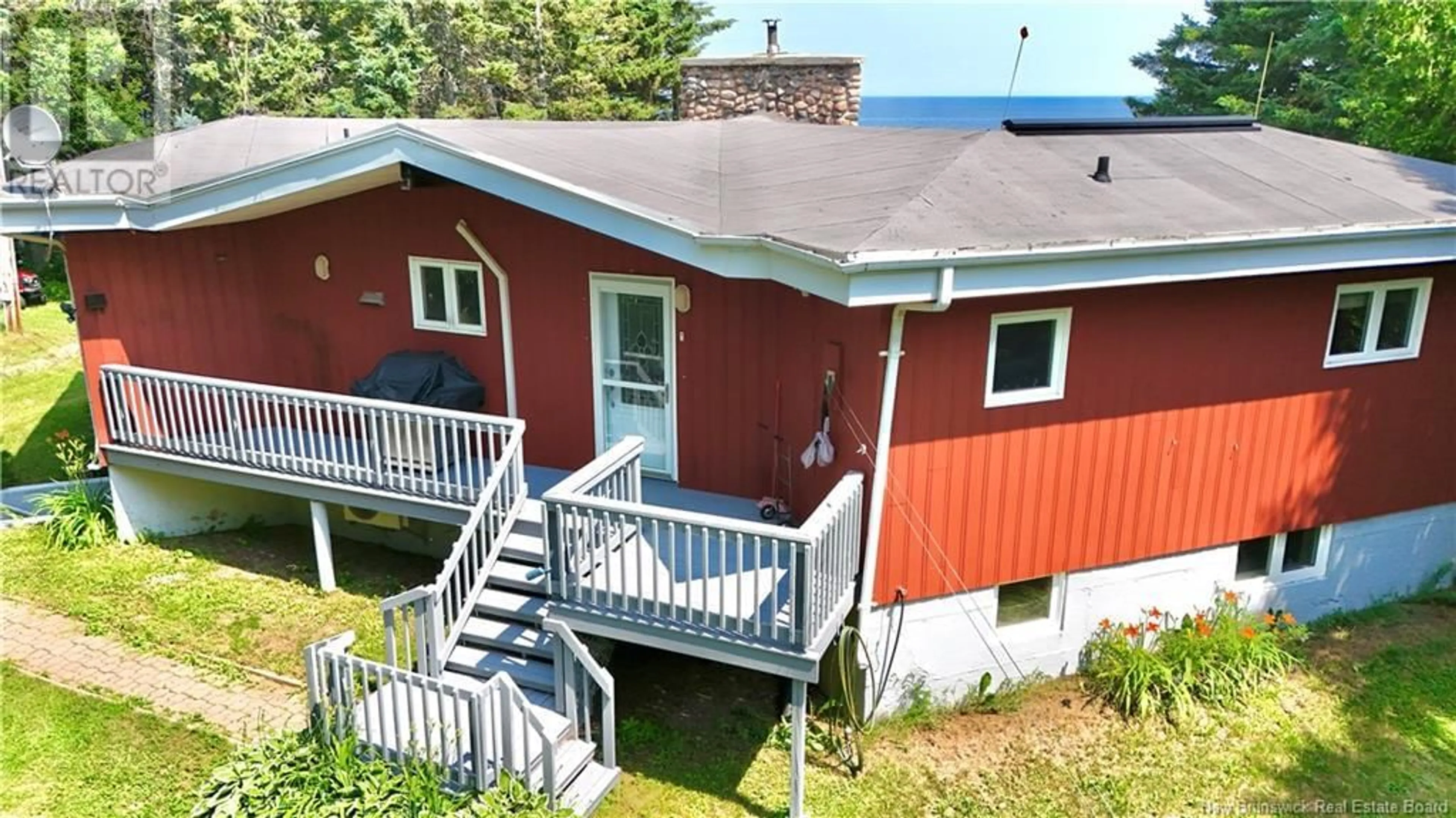 A pic from outside/outdoor area/front of a property/back of a property/a pic from drone, building for 30 OISEAUX, Pointe-Verte New Brunswick E8J2V6