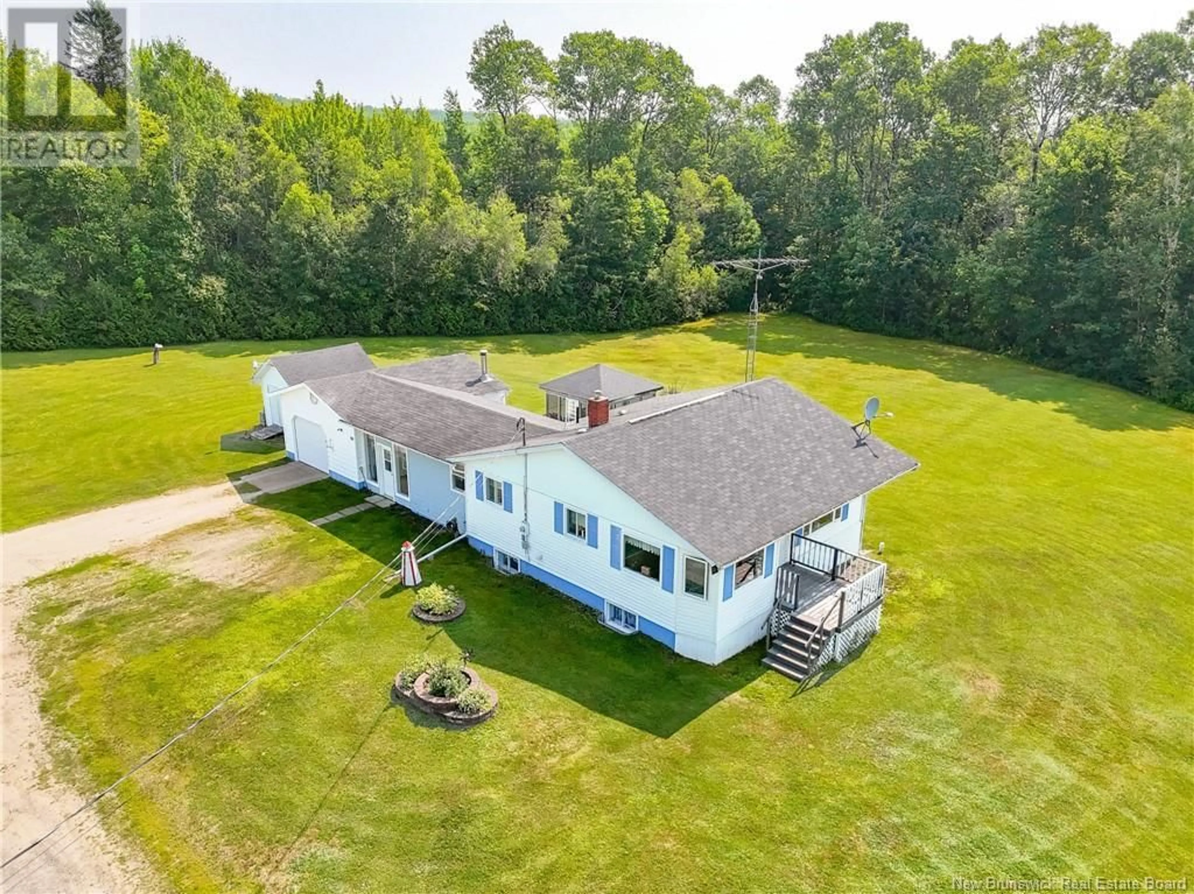 A pic from outside/outdoor area/front of a property/back of a property/a pic from drone, water/lake/river/ocean view for 22 CARVELL ROAD, McAdam New Brunswick E6J1Z8