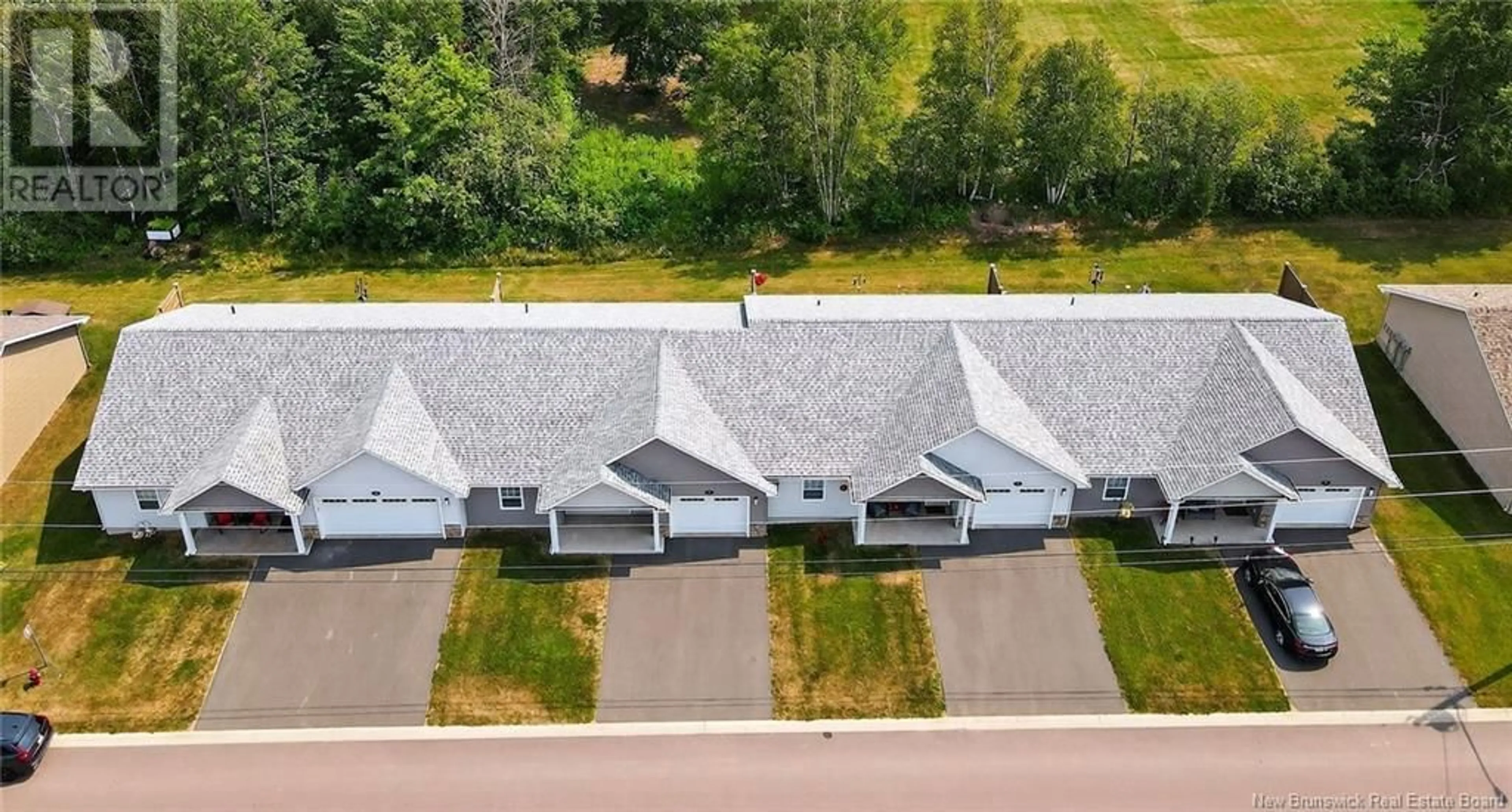 A pic from outside/outdoor area/front of a property/back of a property/a pic from drone, unknown for 38, 42, 46, 50 JACQUES STREET, Shediac New Brunswick E4O0W5