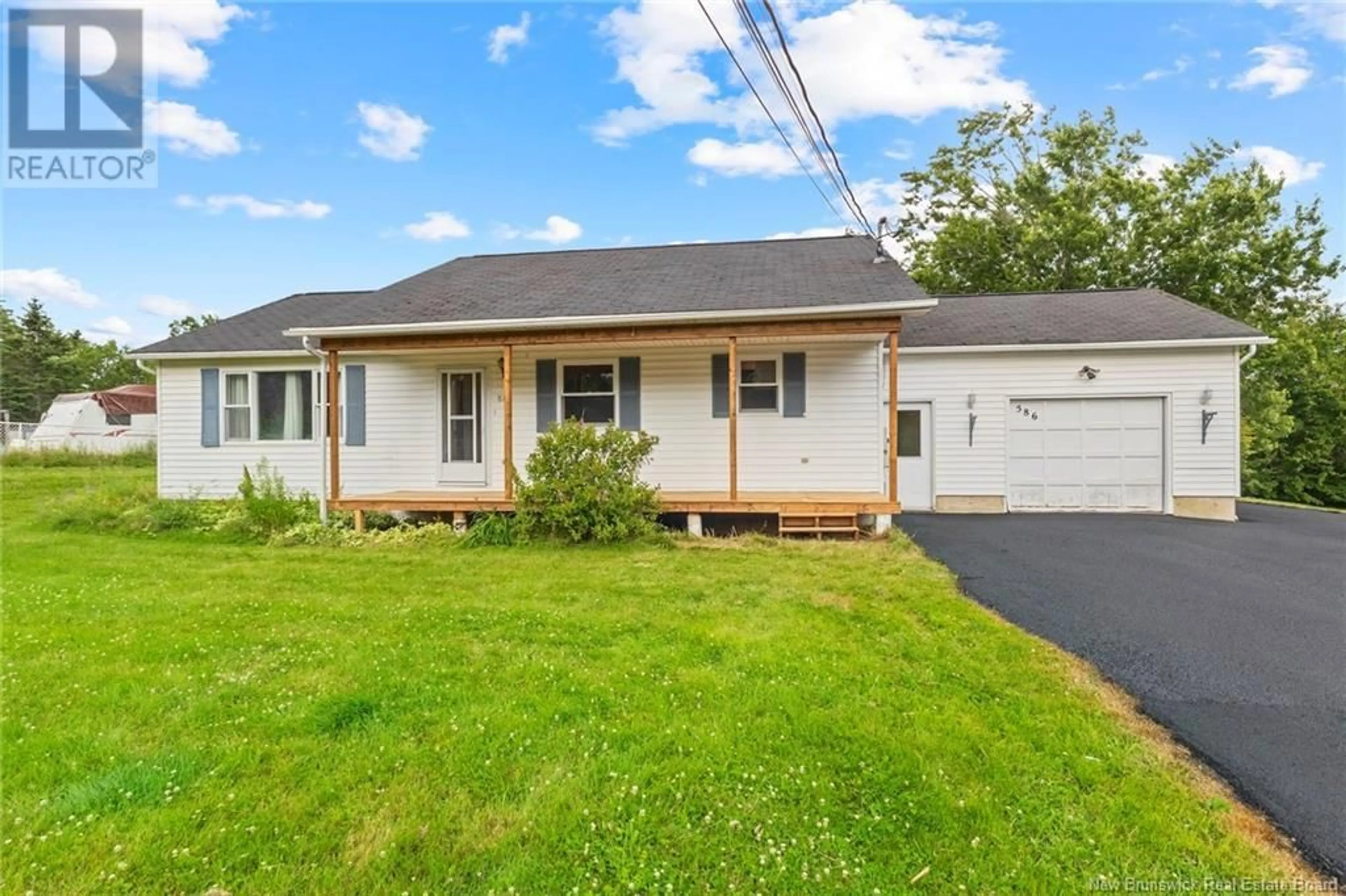 Home with vinyl exterior material, street for 586 CANADA STREET, Fredericton New Brunswick E3A4A7