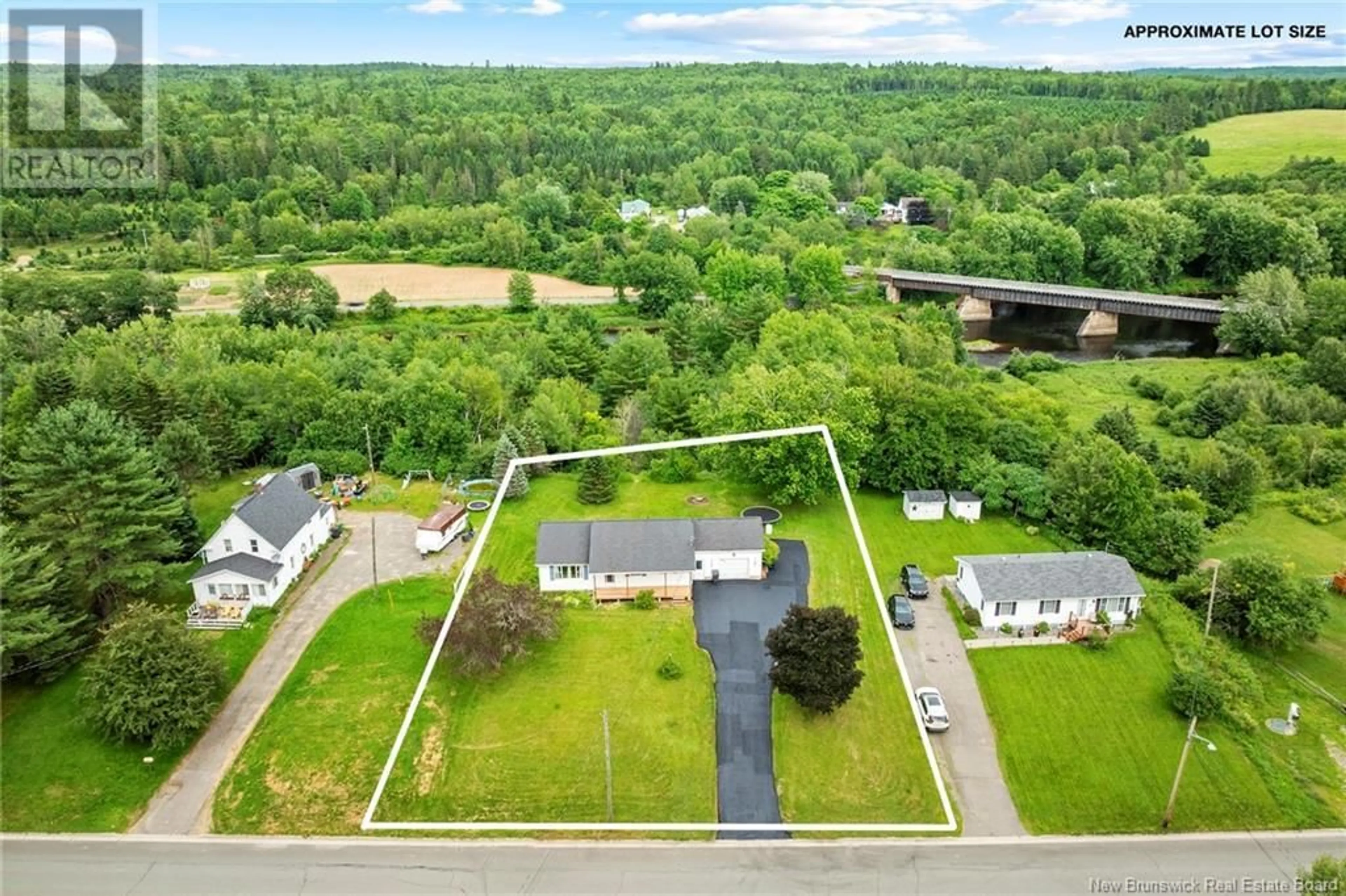 A pic from outside/outdoor area/front of a property/back of a property/a pic from drone, water/lake/river/ocean view for 586 CANADA STREET, Fredericton New Brunswick E3A4A7