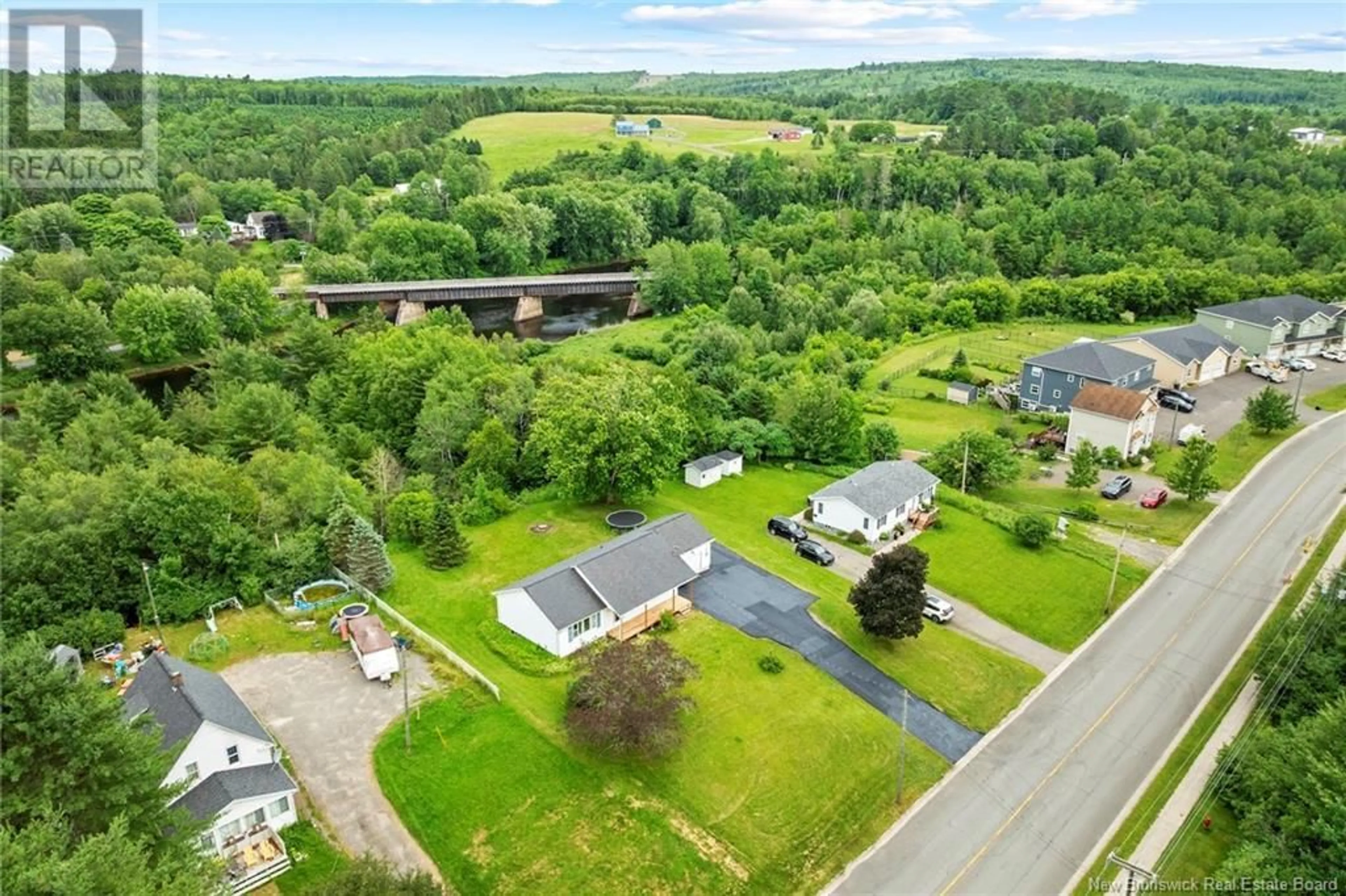 A pic from outside/outdoor area/front of a property/back of a property/a pic from drone, water/lake/river/ocean view for 586 CANADA STREET, Fredericton New Brunswick E3A4A7