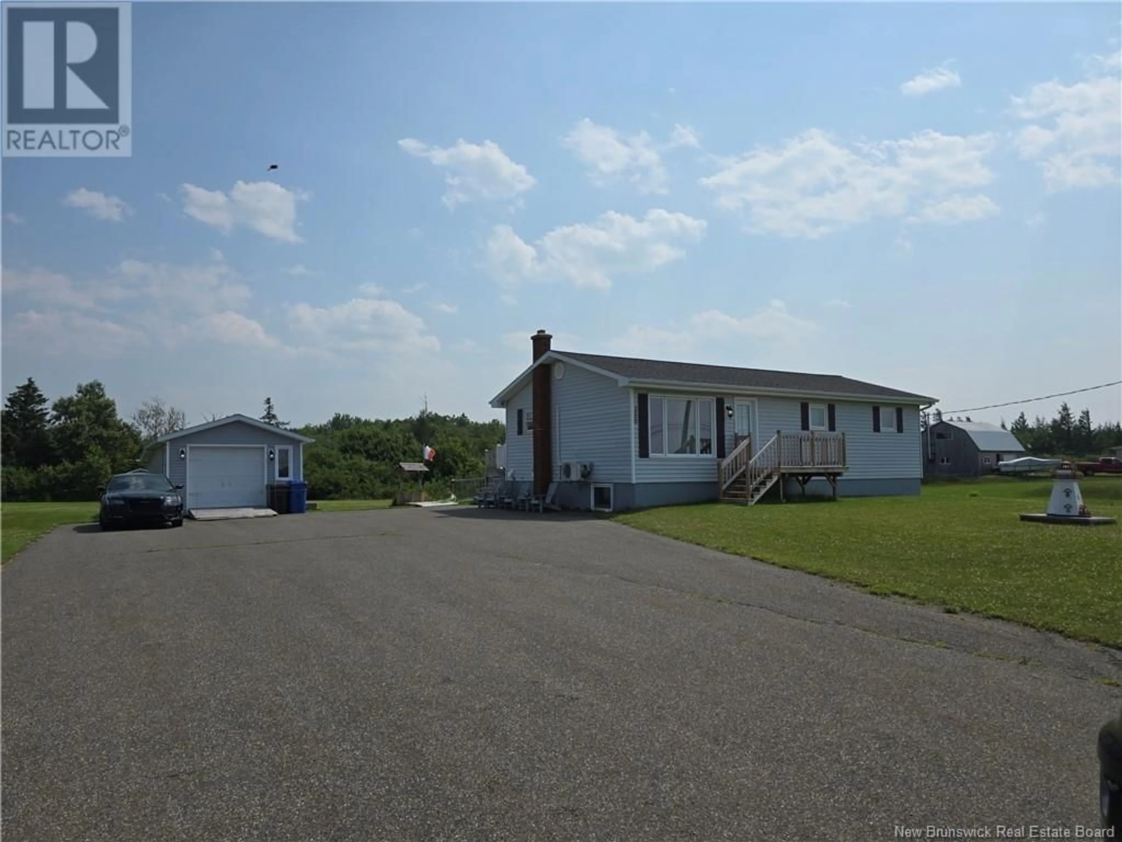 A pic from outside/outdoor area/front of a property/back of a property/a pic from drone, unknown for 5880 ROUTE 11, Janeville New Brunswick E2A5L2
