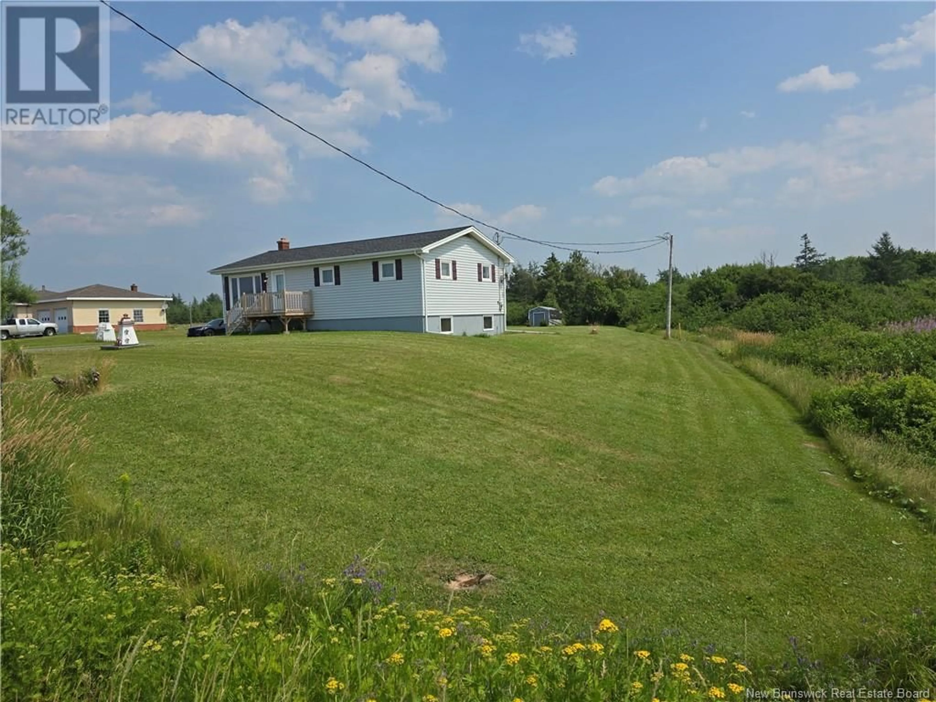 A pic from outside/outdoor area/front of a property/back of a property/a pic from drone, unknown for 5880 ROUTE 11, Janeville New Brunswick E2A5L2