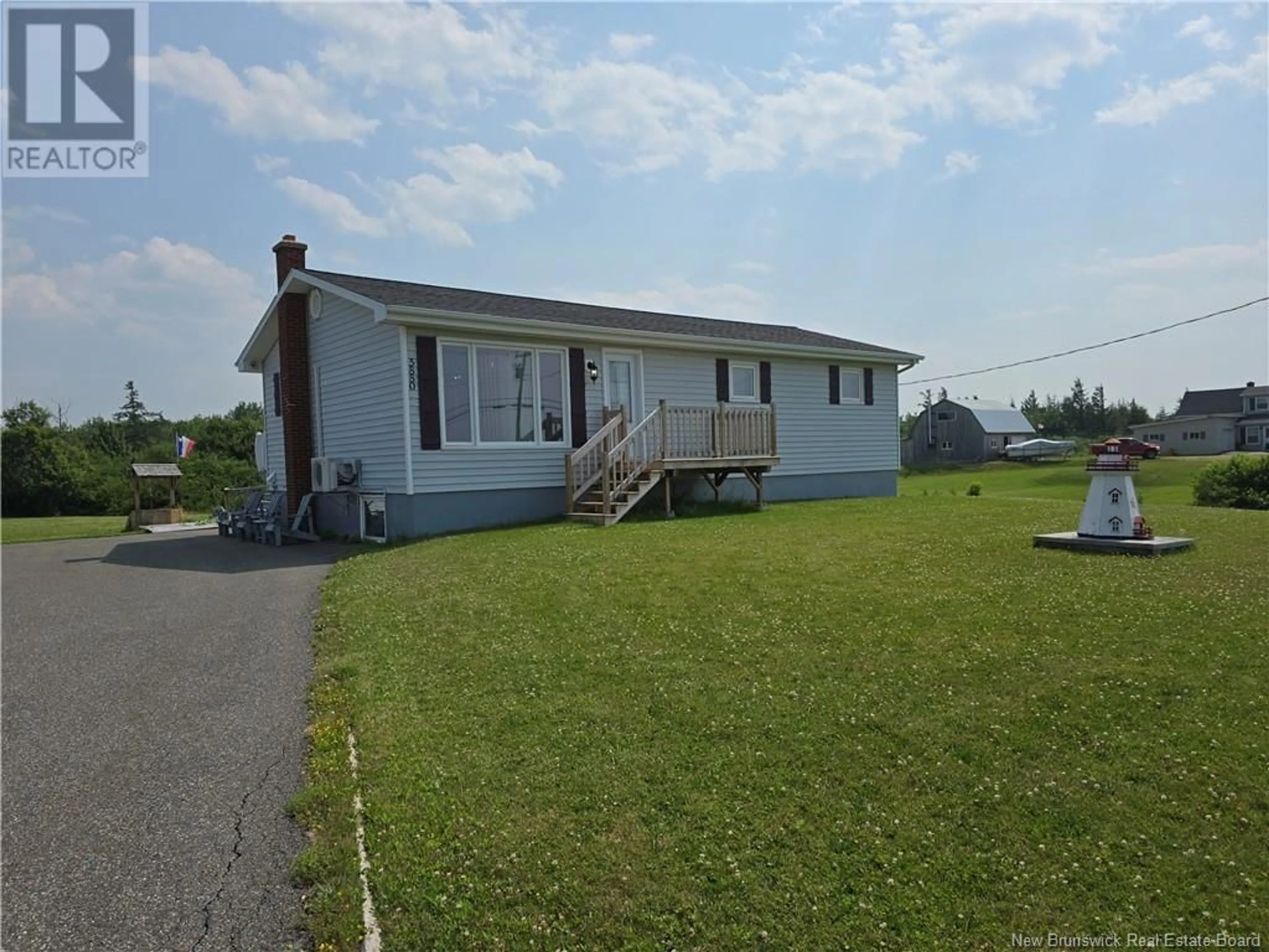 Home with vinyl exterior material, water/lake/river/ocean view for 5880 ROUTE 11, Janeville New Brunswick E2A5L2