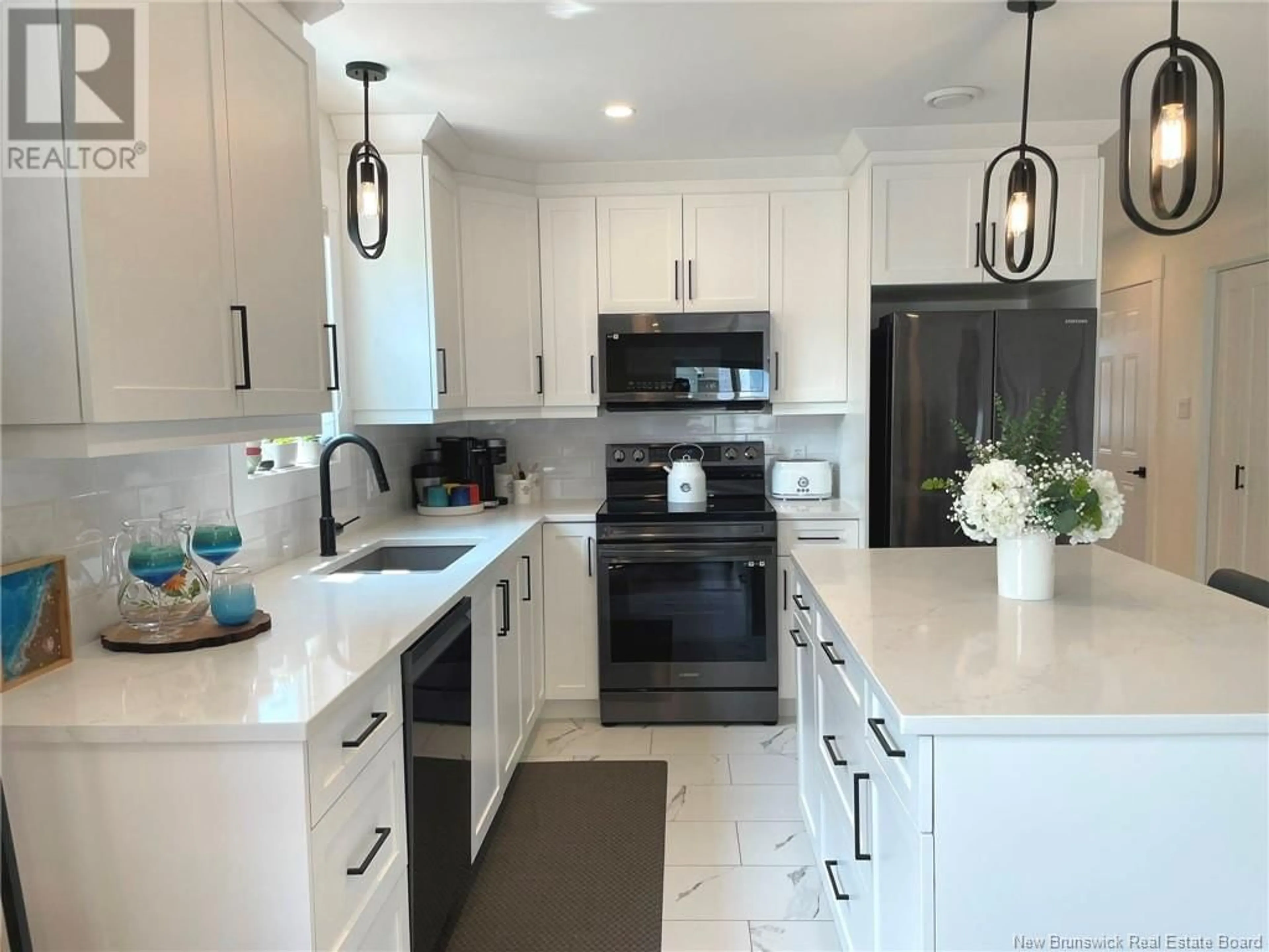 Open concept kitchen, ceramic/tile floor for 140 MONIQUE STREET, Shediac New Brunswick E4P0N8