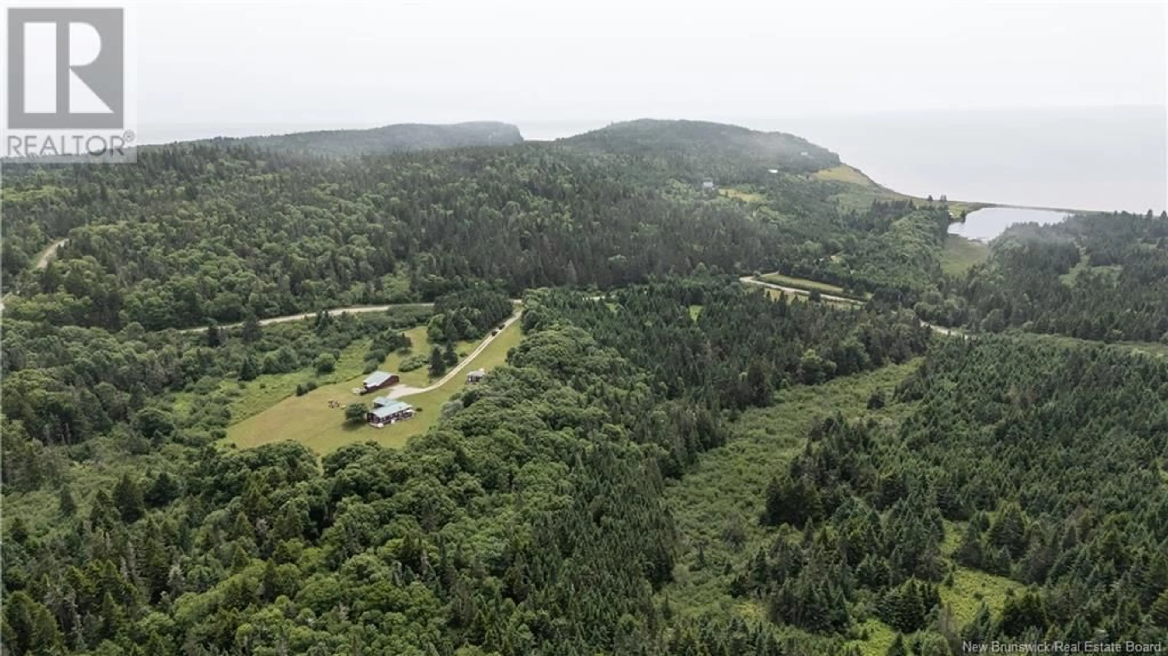 A pic from outside/outdoor area/front of a property/back of a property/a pic from drone, forest/trees view for 279 CAPE ENRAGE ROAD, Waterside New Brunswick E4H4L2