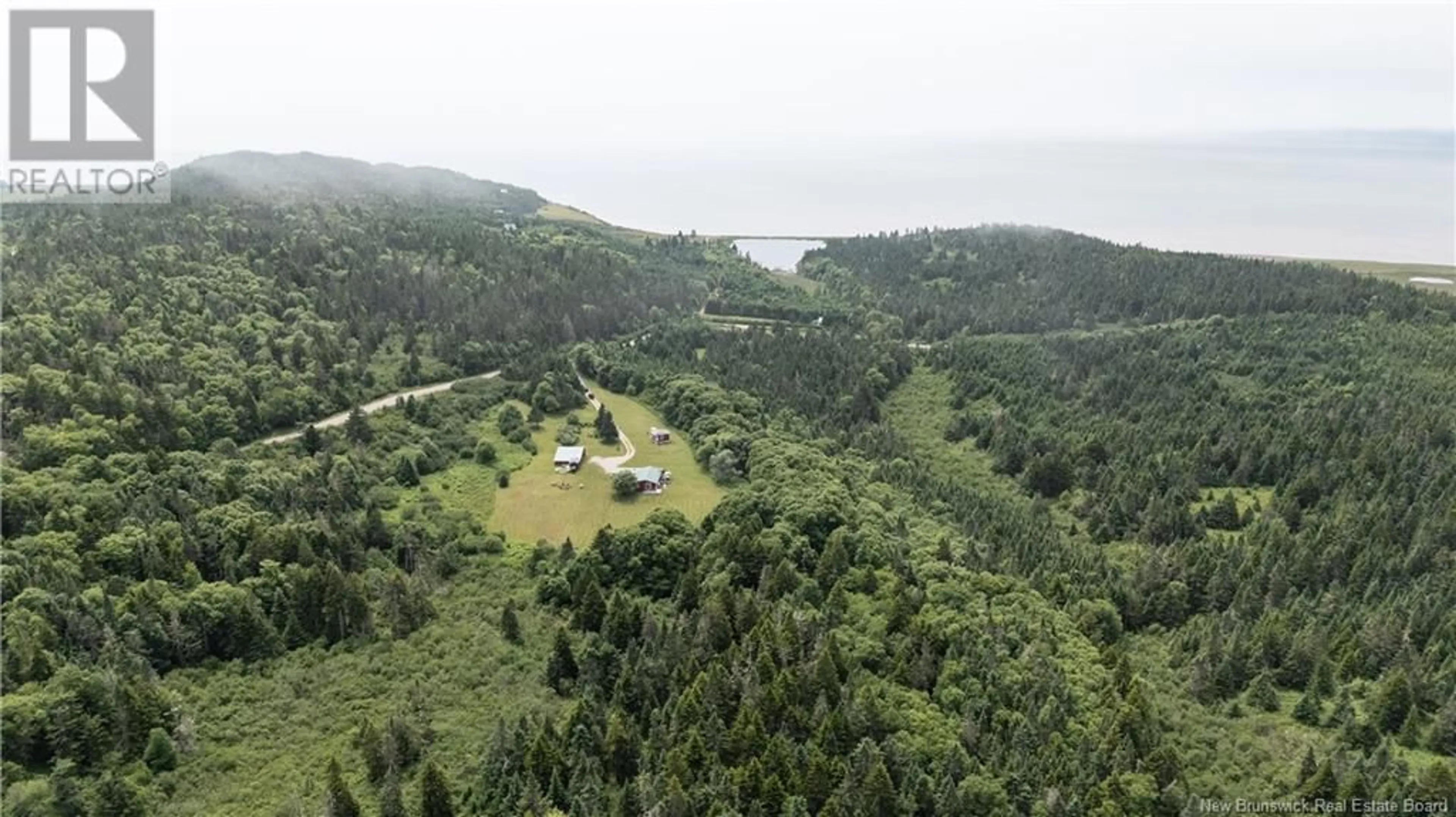 A pic from outside/outdoor area/front of a property/back of a property/a pic from drone, forest/trees view for 279 CAPE ENRAGE ROAD, Waterside New Brunswick E4H4L2