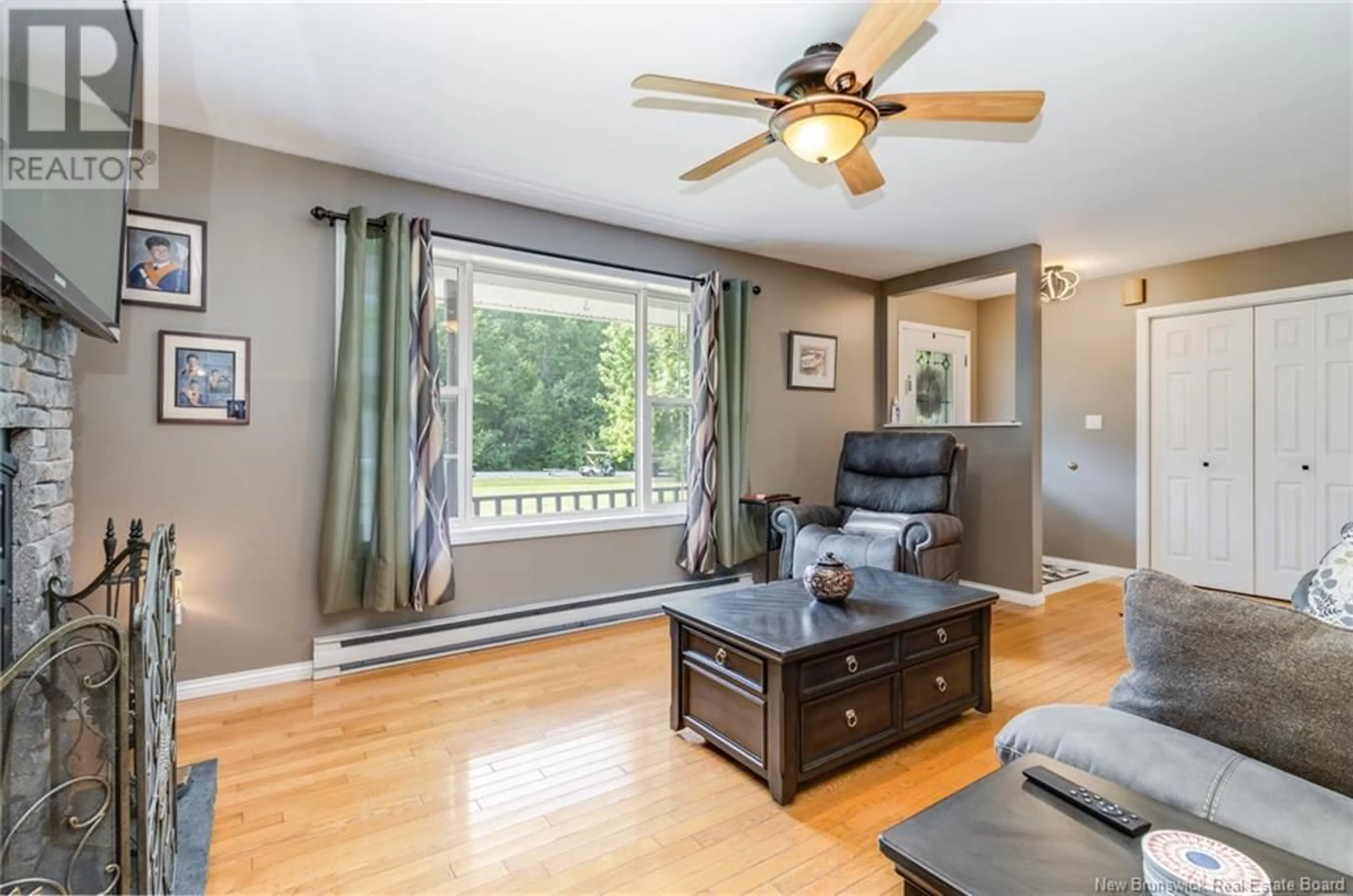 Living room with furniture, wood/laminate floor for 49 BURTON EVERGREEN DRIVE, Burton New Brunswick E2V3E4
