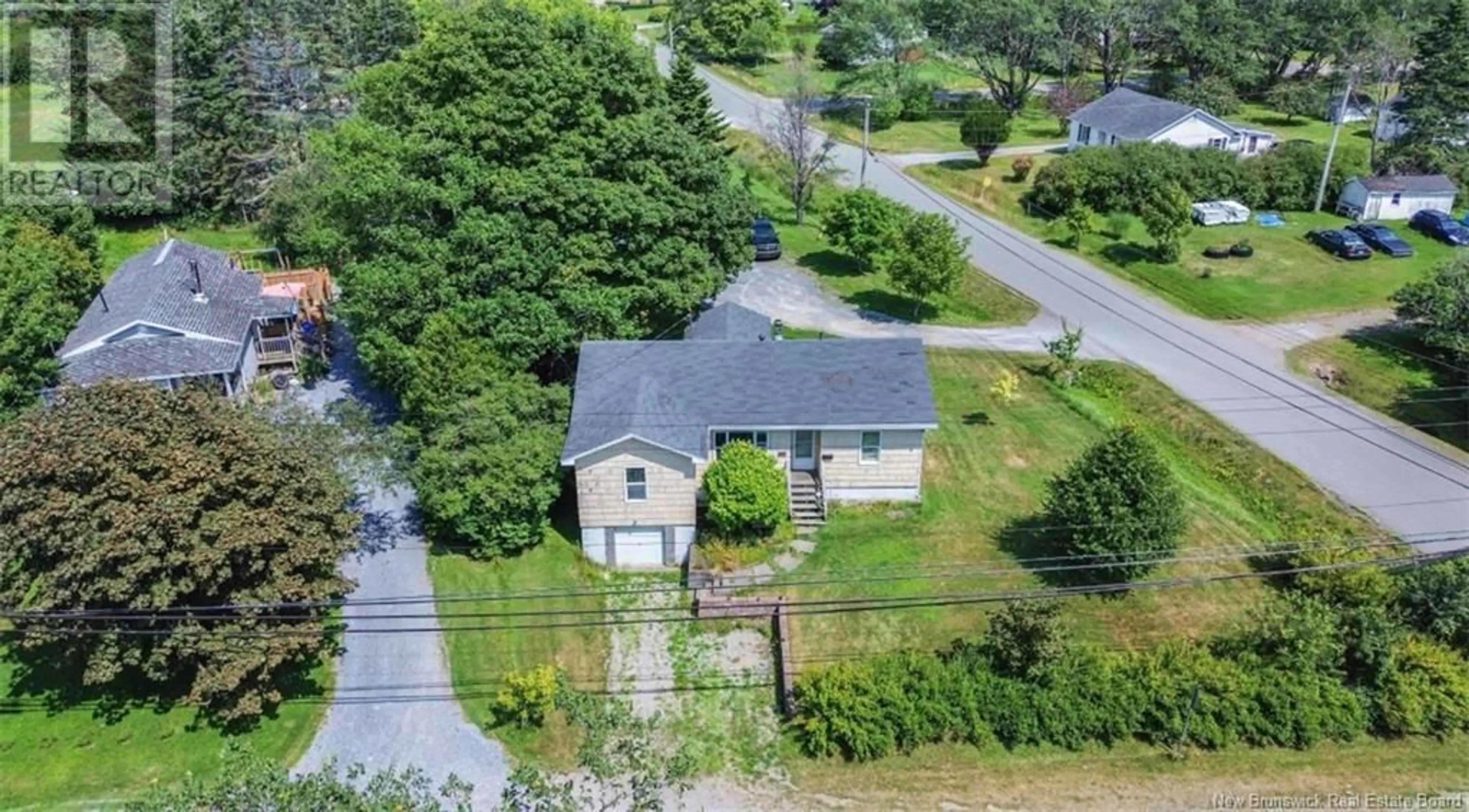 A pic from outside/outdoor area/front of a property/back of a property/a pic from drone, street for 1395 RED HEAD ROAD, Saint John New Brunswick E2P1K2