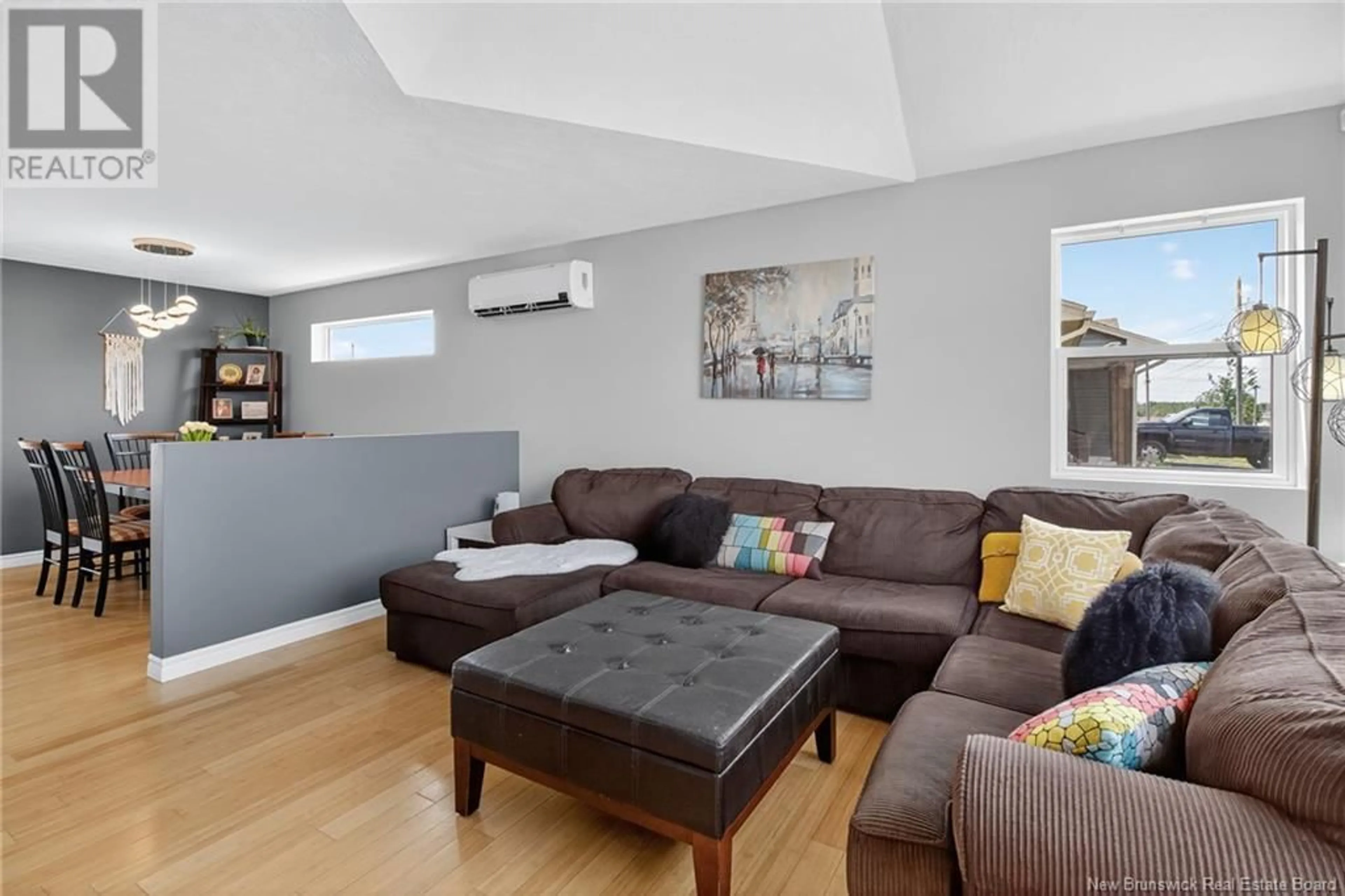 Living room with furniture, wood/laminate floor for 11 HOLLY ROAD, Riverview New Brunswick E1B0E8