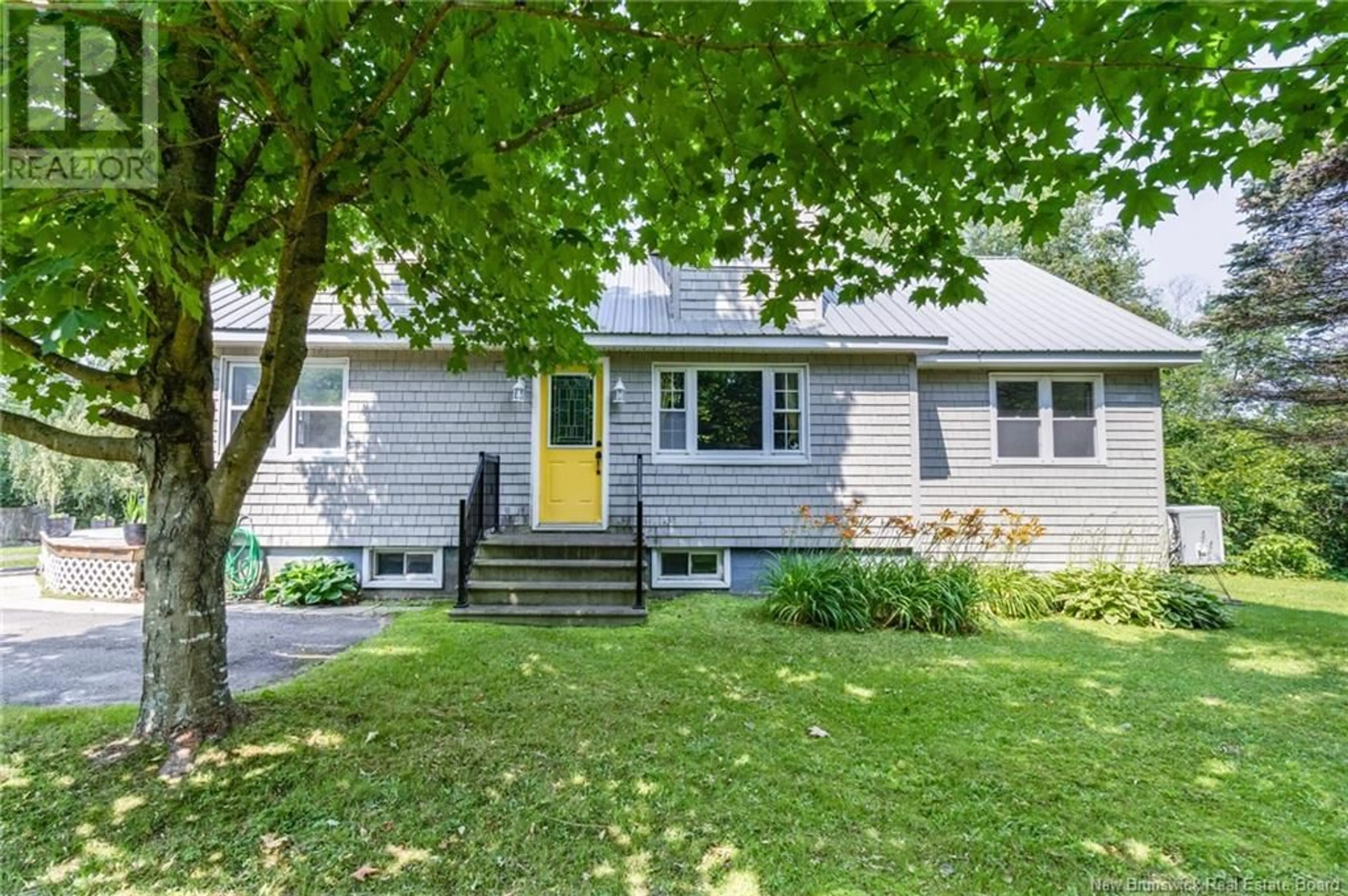 Home with vinyl exterior material, street for 209 SAUNDERS ROAD, McAdam New Brunswick E6J1M3