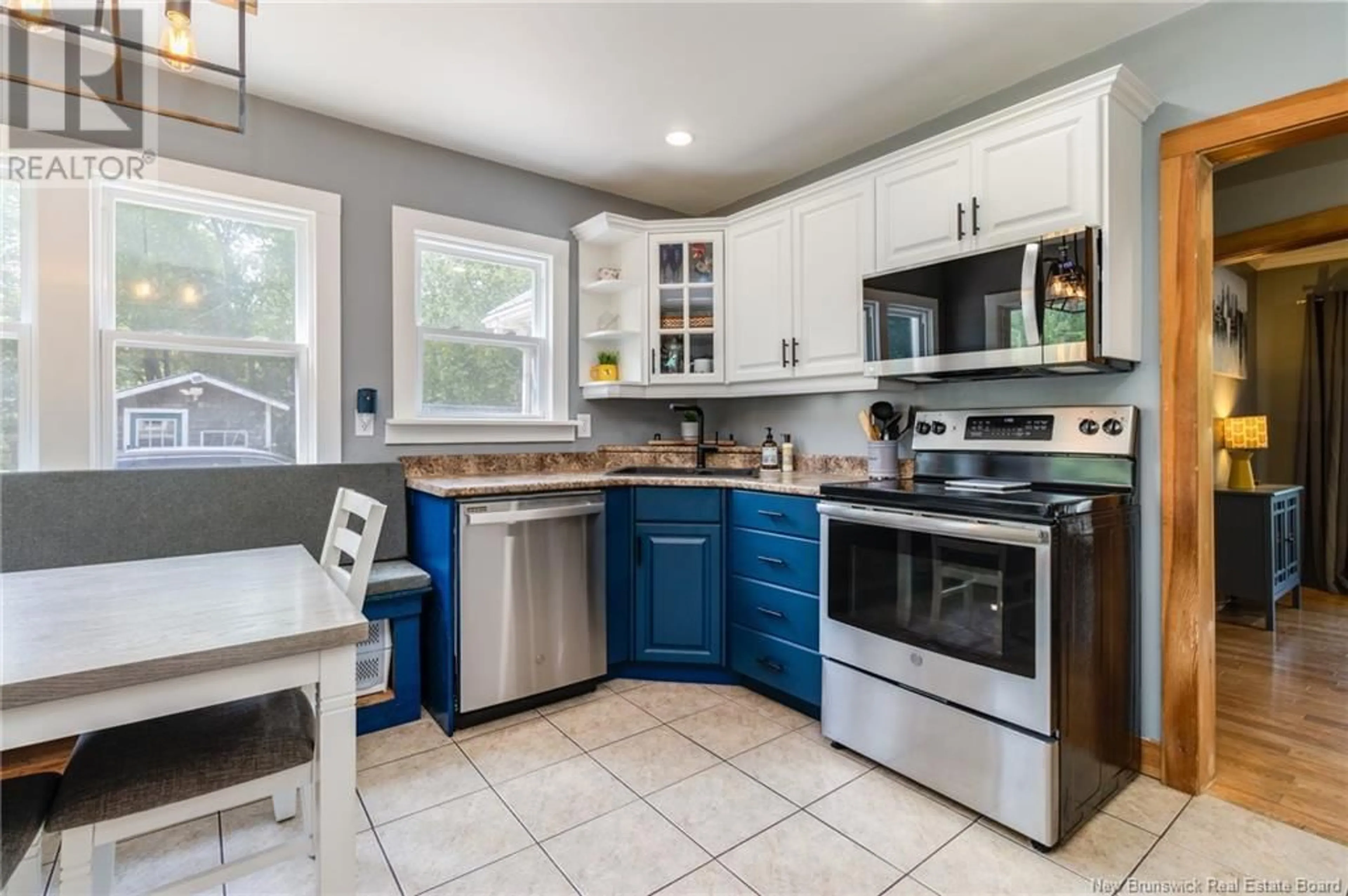 Open concept kitchen, ceramic/tile floor for 209 SAUNDERS ROAD, McAdam New Brunswick E6J1M3