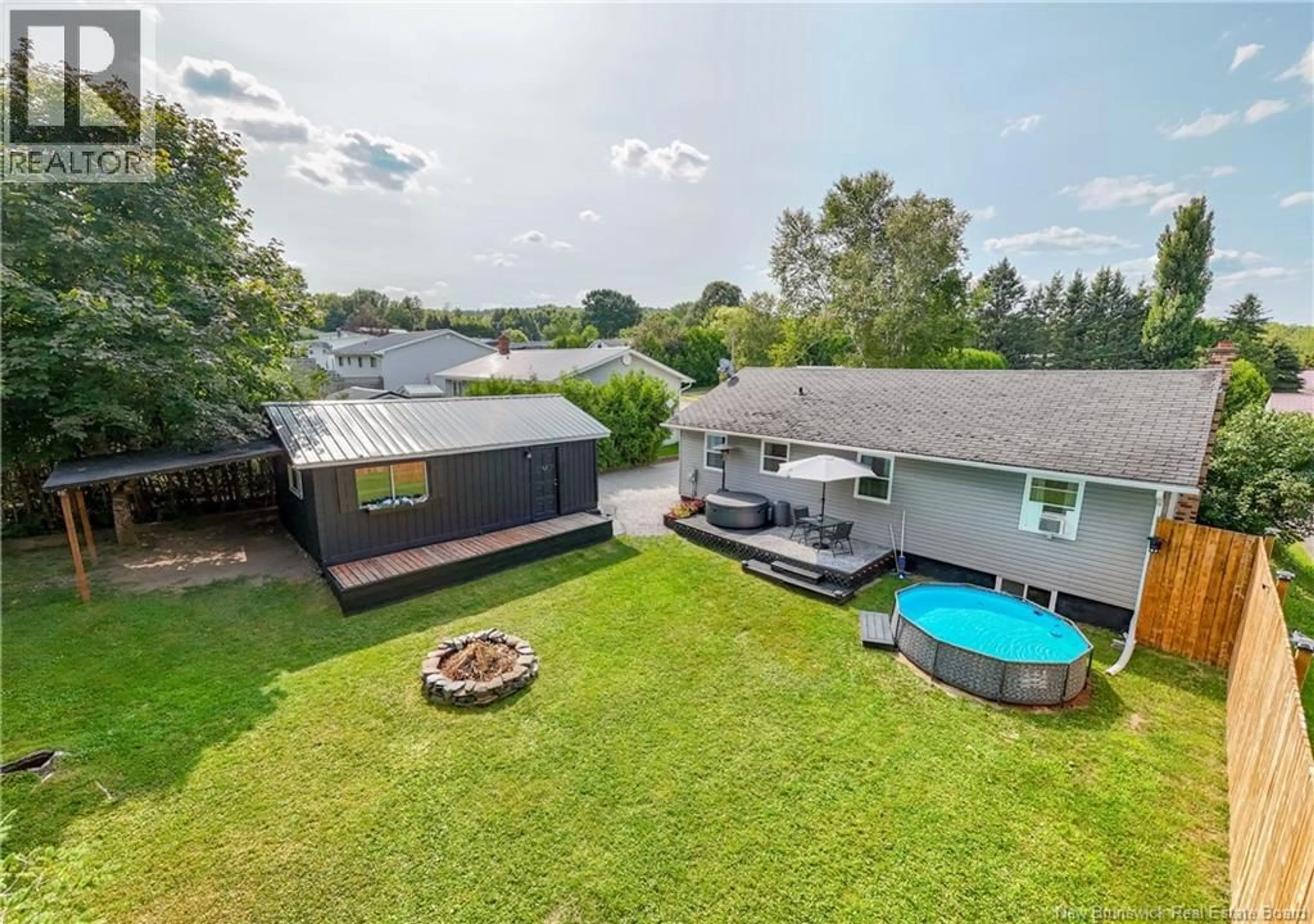 A pic from outside/outdoor area/front of a property/back of a property/a pic from drone, unknown for 57 SNOWBALL CRESCENT, Nackawic New Brunswick E6G1C8