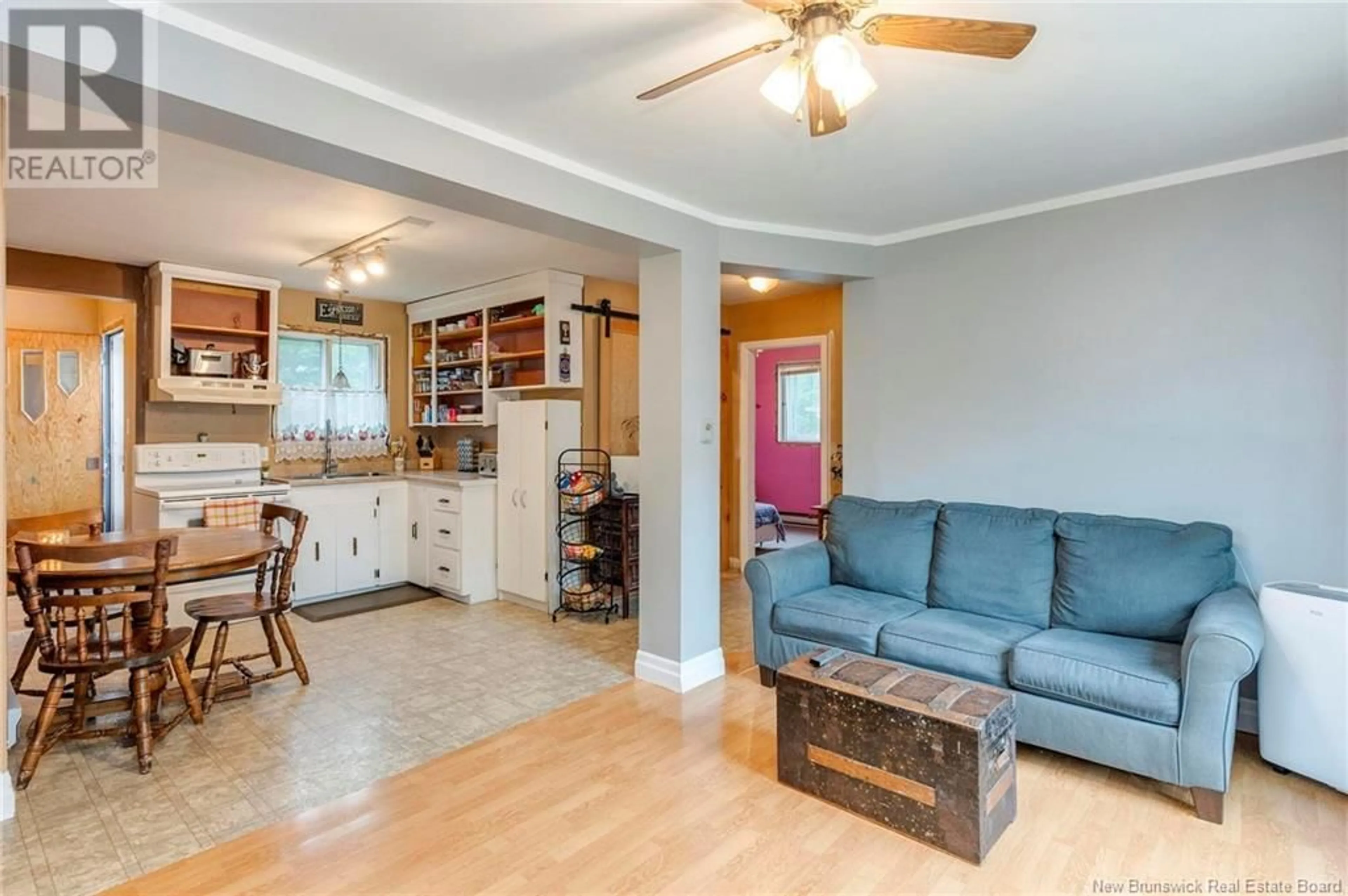 Living room with furniture, wood/laminate floor for 30 CROSS STREET, Moncton New Brunswick E1A3C4