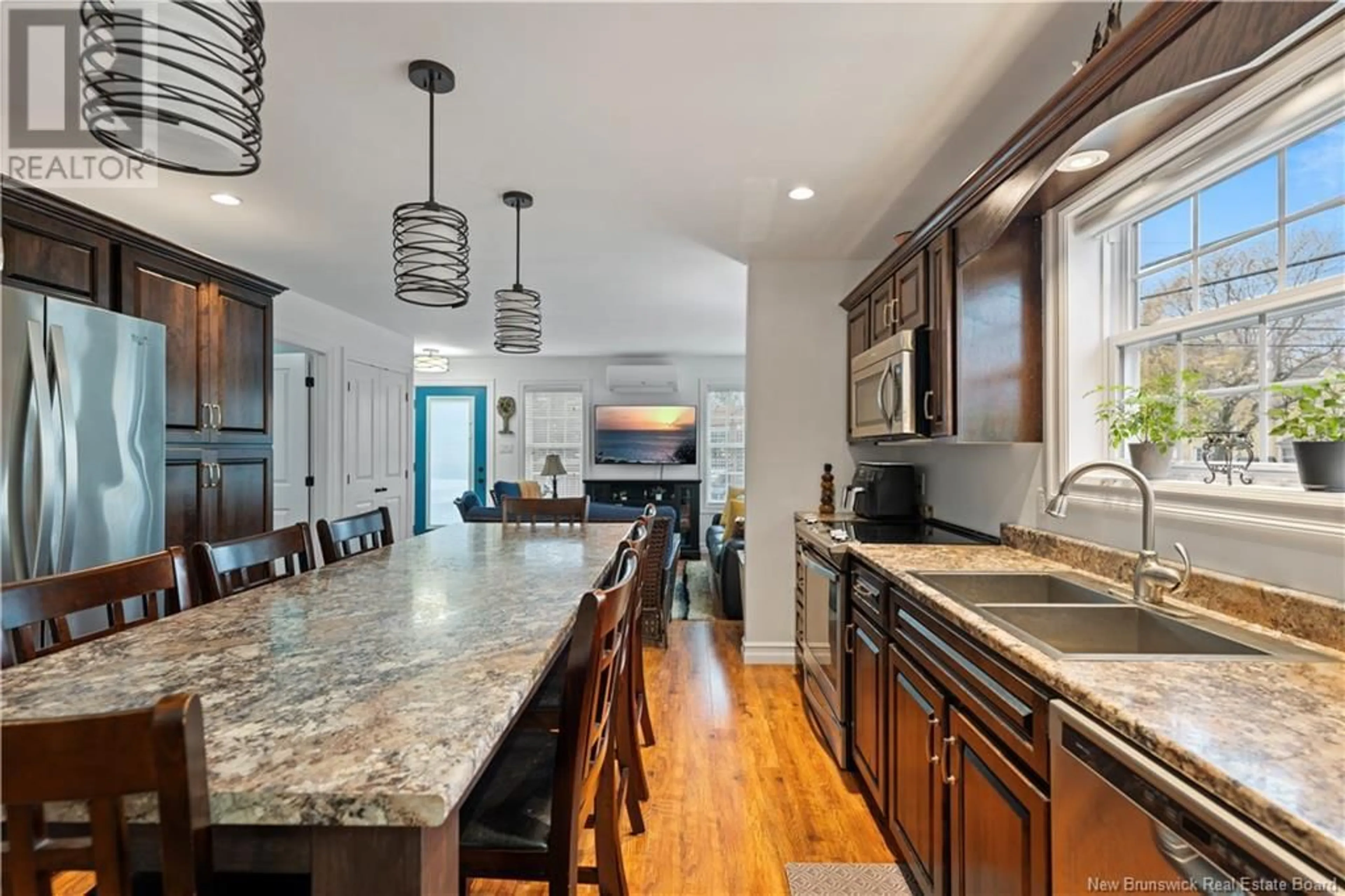 Open concept kitchen, ceramic/tile floor for 3 BRYDGES STREET, Pointe-Du-Chêne New Brunswick E4P3X6