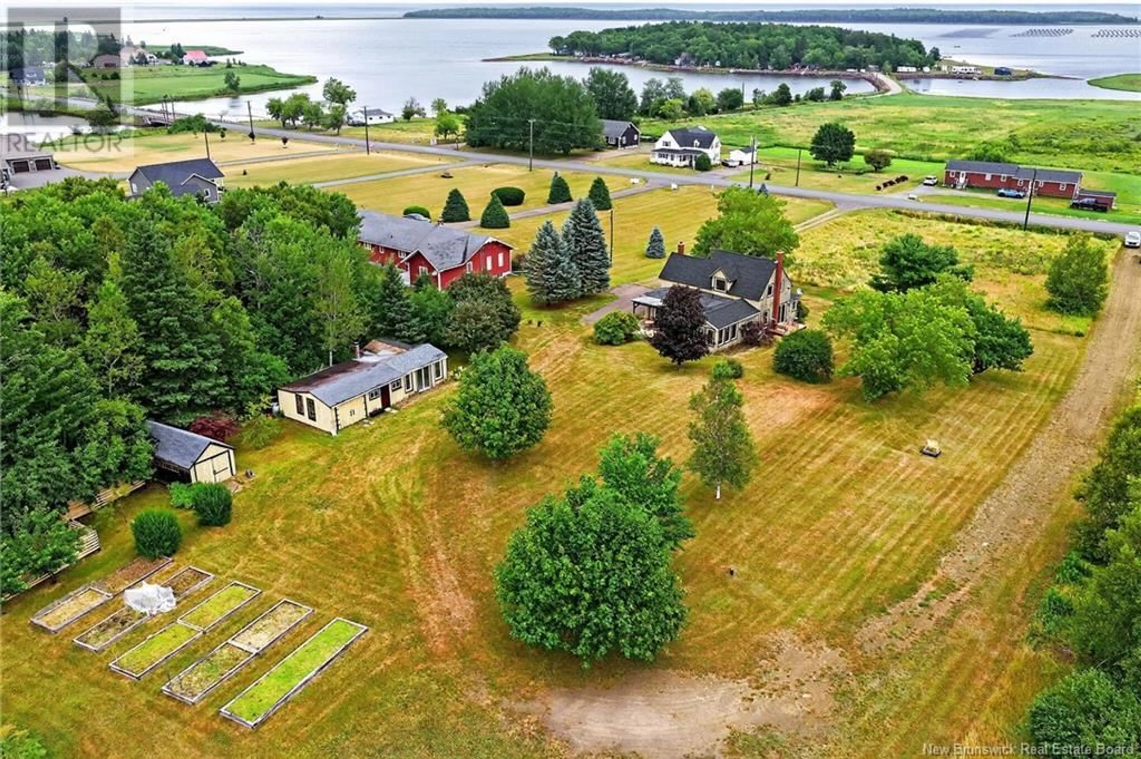 A pic from outside/outdoor area/front of a property/back of a property/a pic from drone, water/lake/river/ocean view for 2859 ROUTE 535, Cocagne New Brunswick E4R3E2