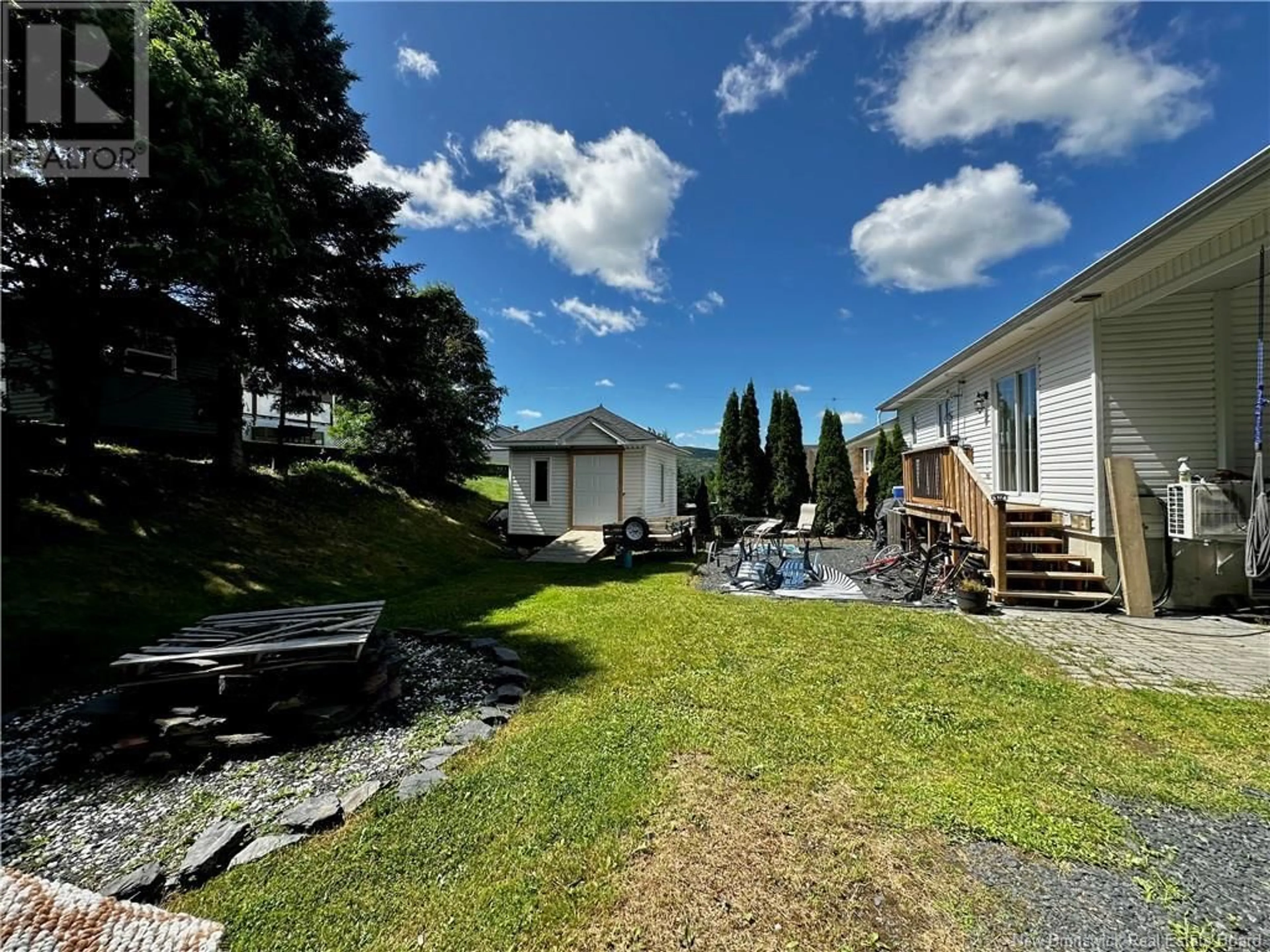 A pic from outside/outdoor area/front of a property/back of a property/a pic from drone, water/lake/river/ocean view for 139 BELISLE AVENUE, Edmundston New Brunswick E3V4C7