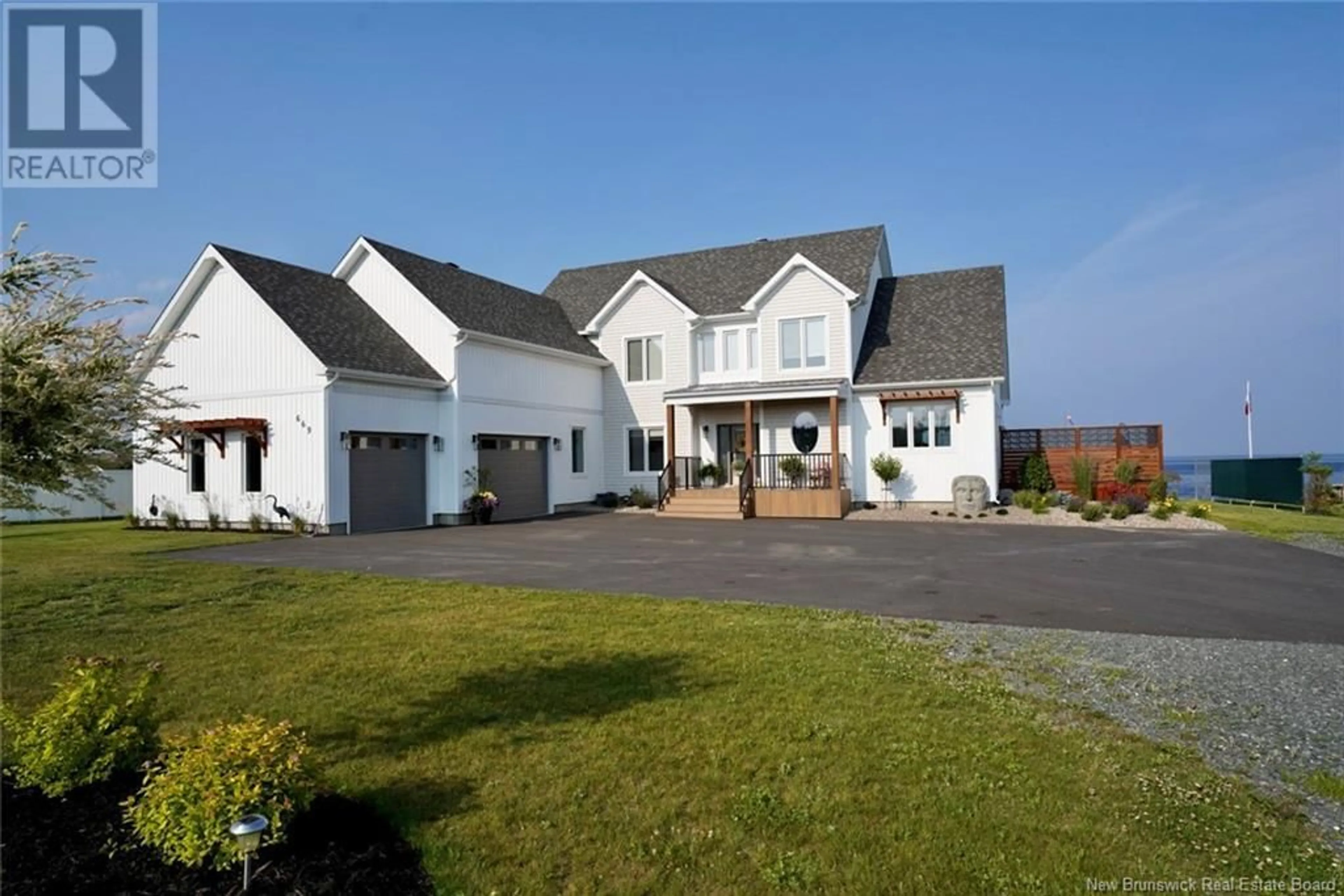 A pic from outside/outdoor area/front of a property/back of a property/a pic from drone, unknown for 669 PRINCIPALE STREET, Petit-Rocher New Brunswick E8J3A1