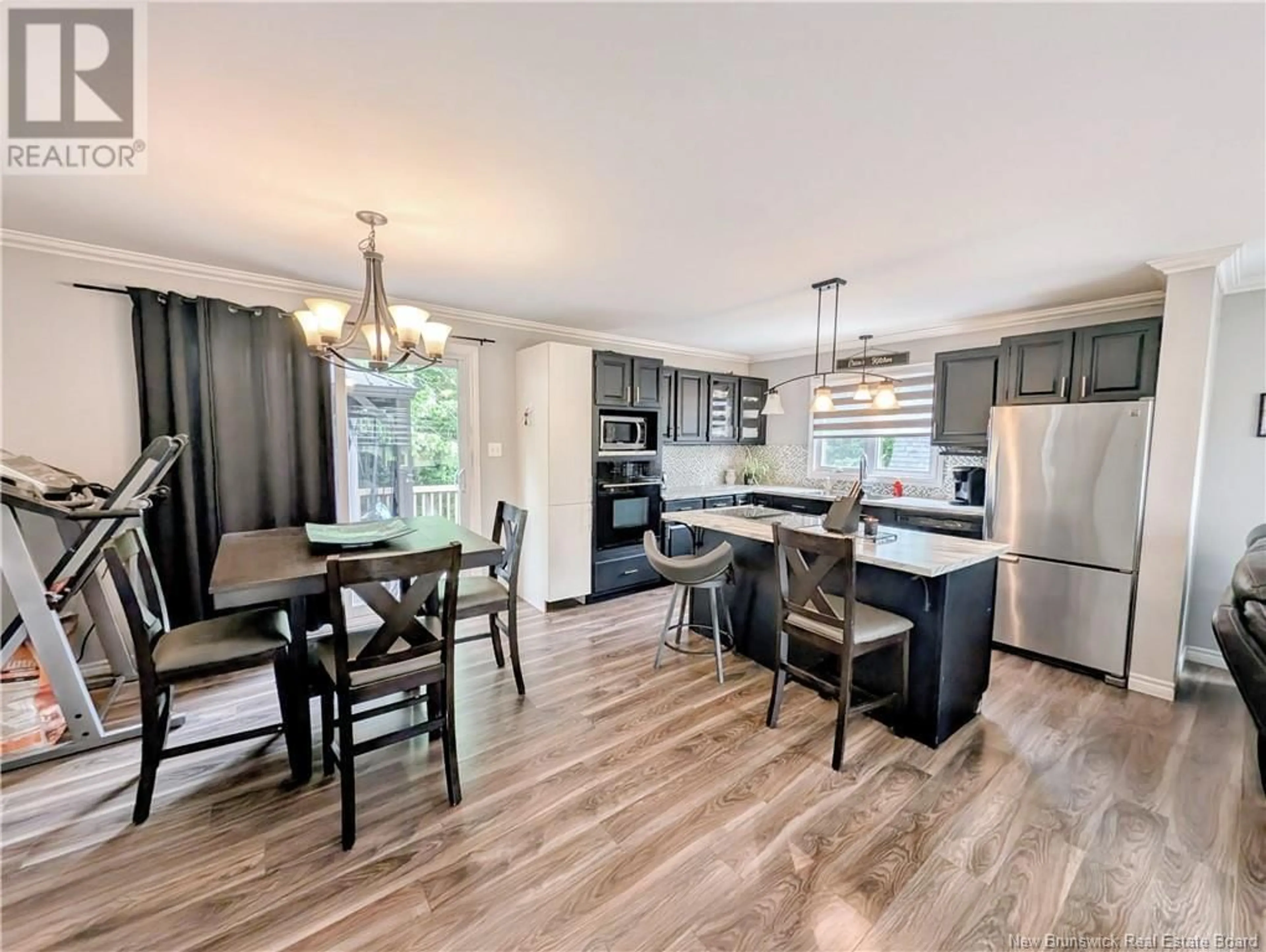 Open concept kitchen, wood/laminate floor for 8598 NB-150, Losier Settlement New Brunswick E1X3B9
