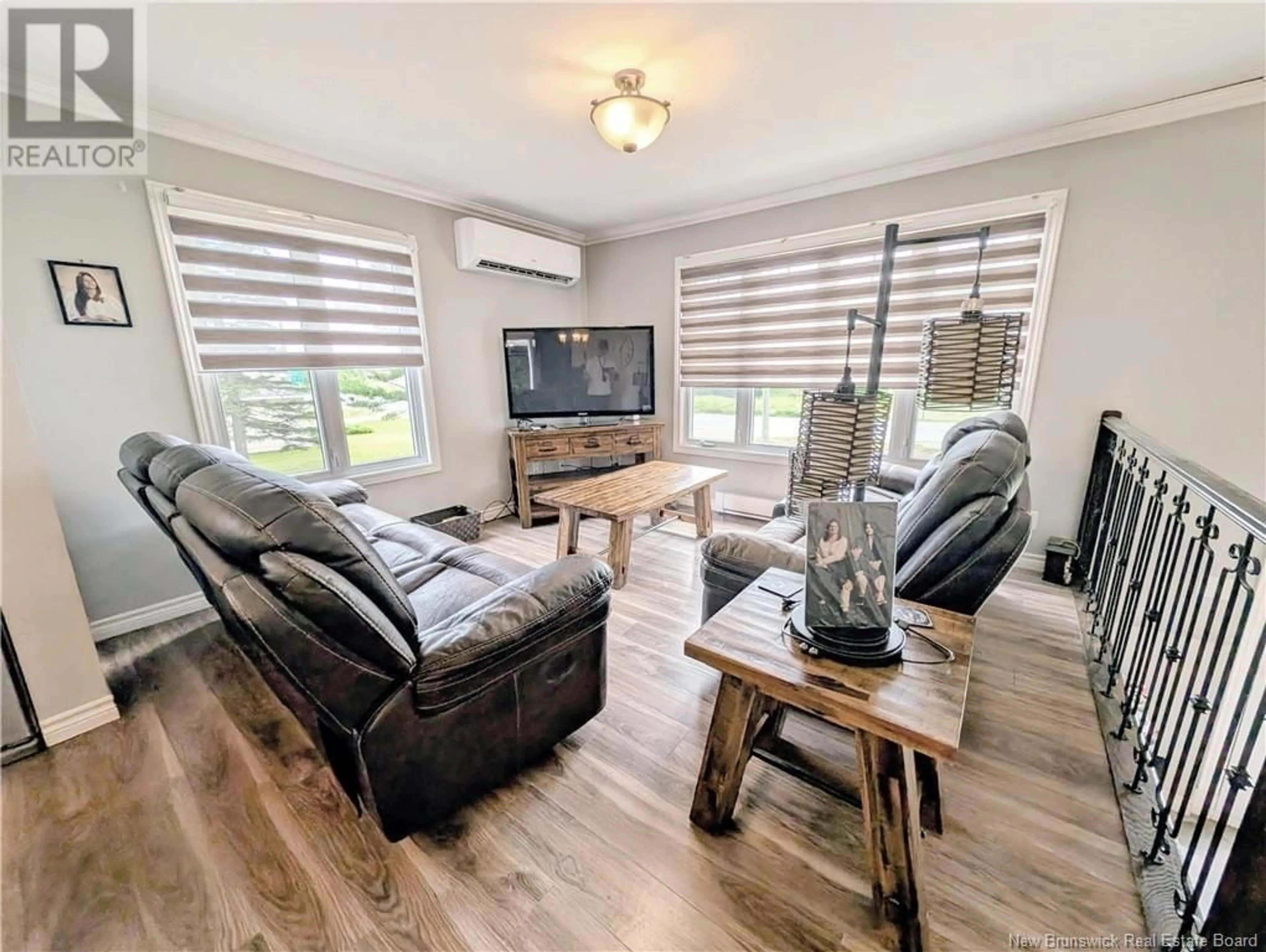 Living room with furniture, wood/laminate floor for 8598 NB-150, Losier Settlement New Brunswick E1X3B9