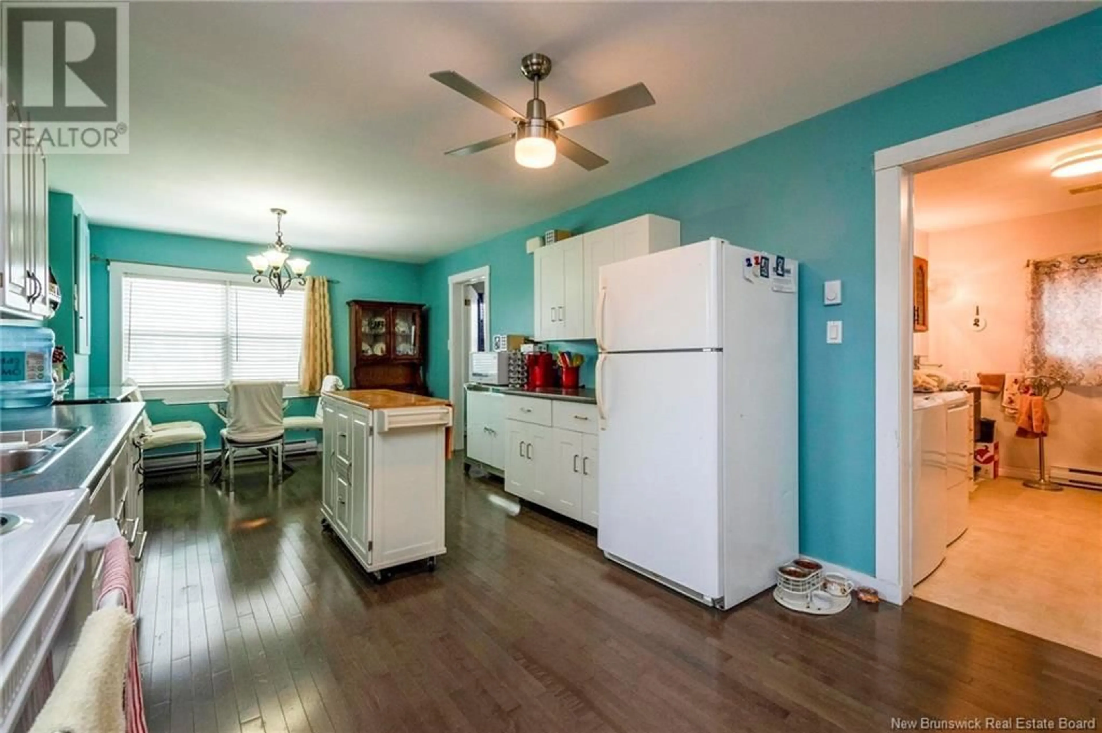 Open concept kitchen, wood/laminate floor for 177 BELLEVUE STREET, Saint John New Brunswick E2J1L8