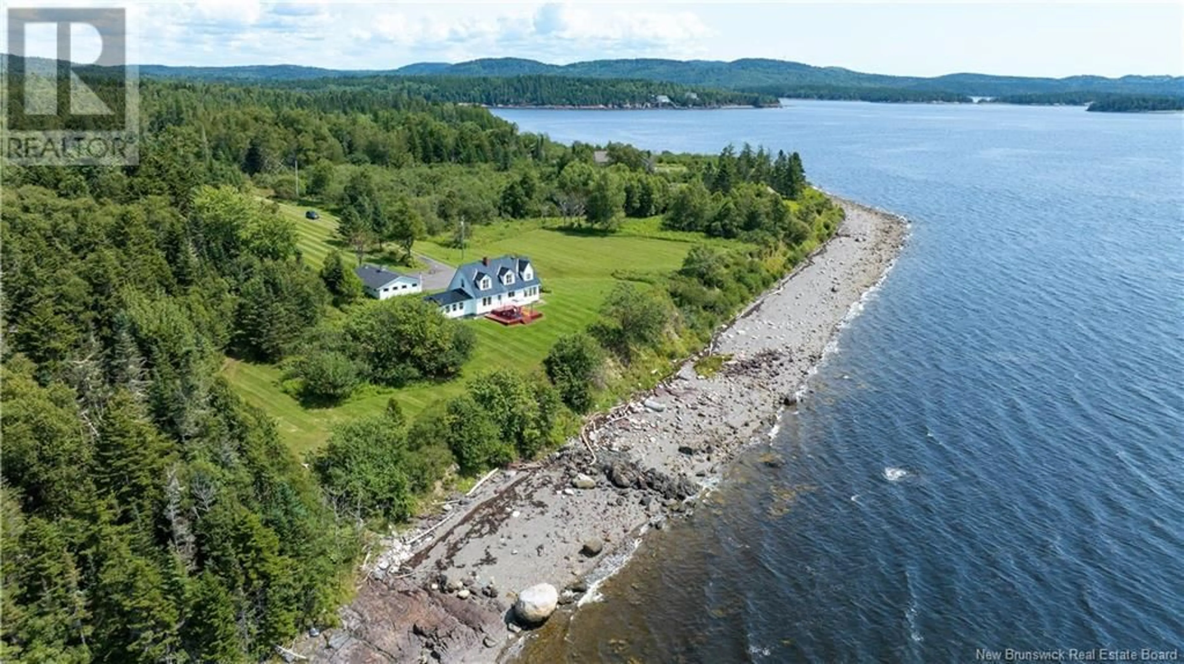 A pic from outside/outdoor area/front of a property/back of a property/a pic from drone, water/lake/river/ocean view for 280 HOLTS POINT ROAD, Bocabec New Brunswick E5B3N4