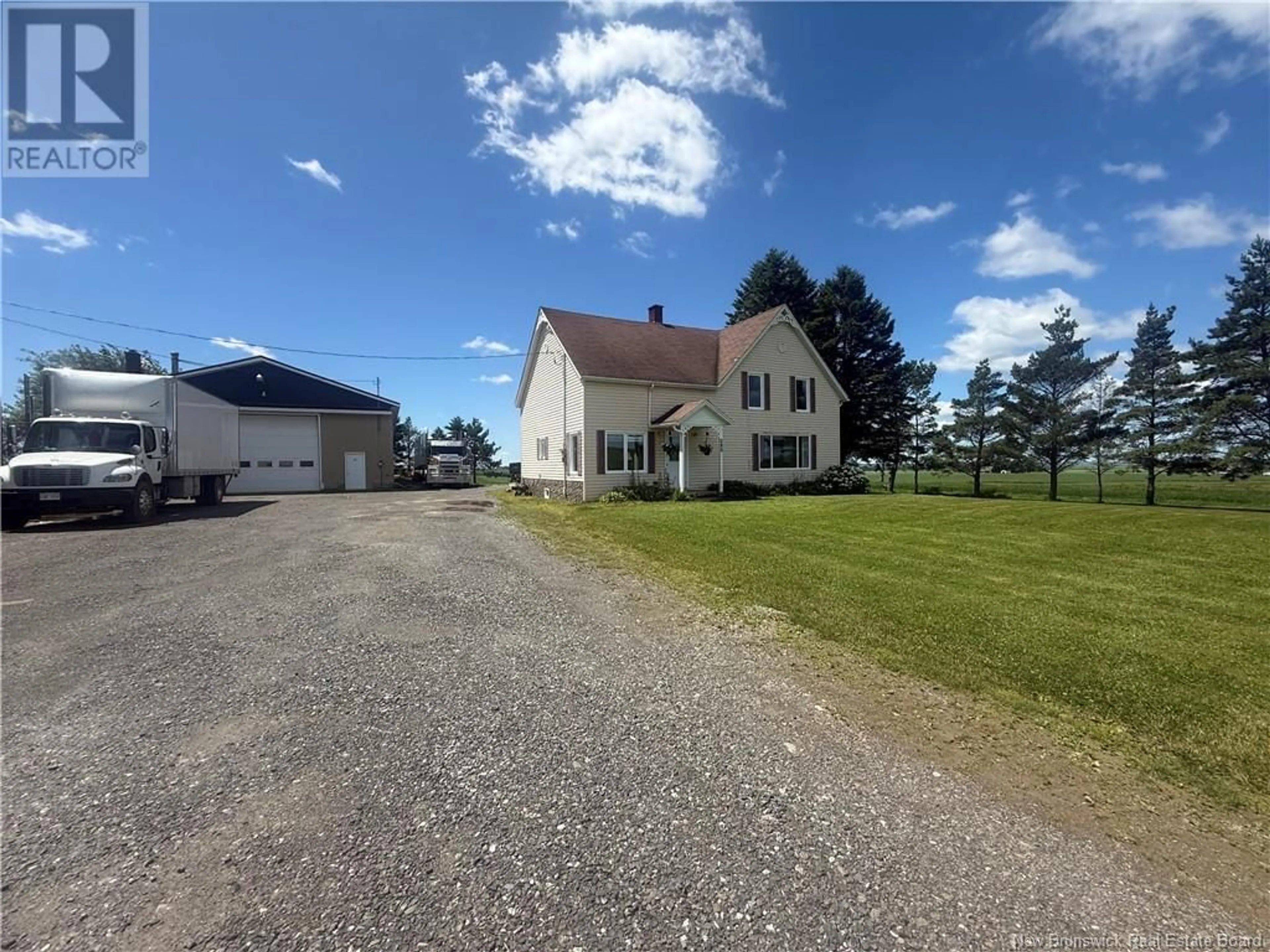 A pic from outside/outdoor area/front of a property/back of a property/a pic from drone, street for 289 1IER RANG, DSL de Drummond/DSL of Drummond New Brunswick E3Y2S7