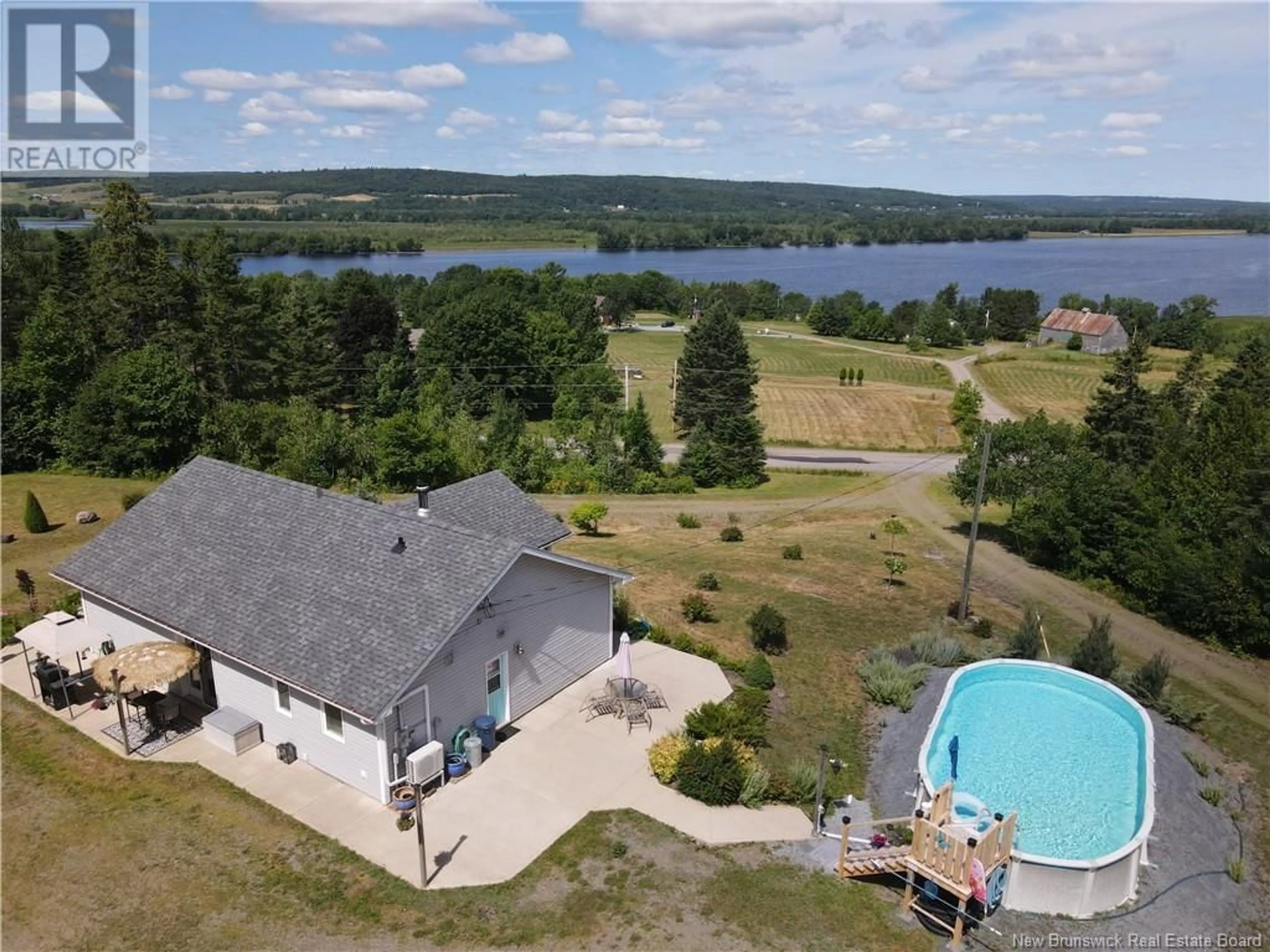 A pic from outside/outdoor area/front of a property/back of a property/a pic from drone, water/lake/river/ocean view for 1330 ROUTE 705, Wickham New Brunswick E5T3W1