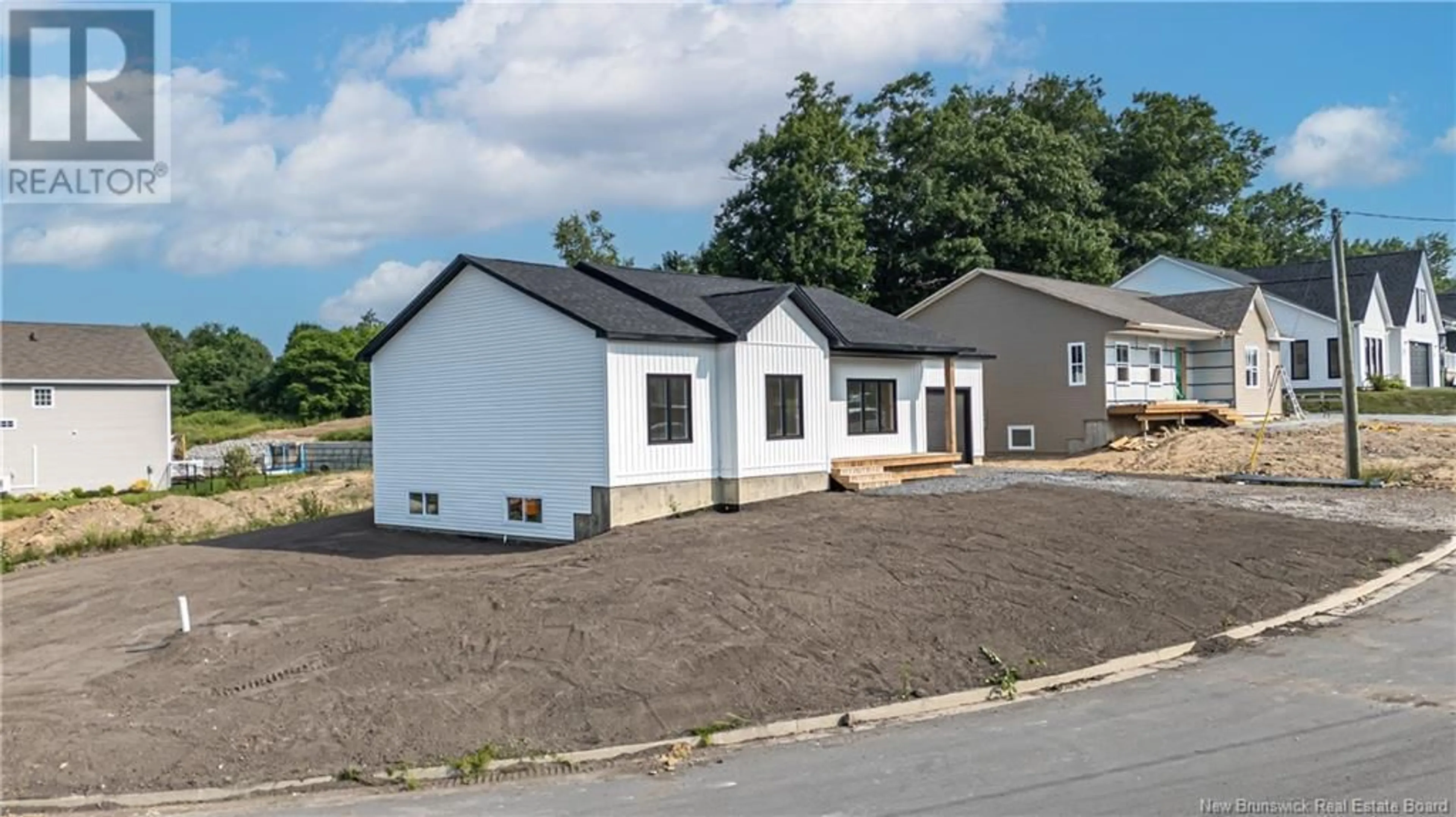 A pic from outside/outdoor area/front of a property/back of a property/a pic from drone, building for 201 GILRIDGE DRIVE, Fredericton New Brunswick E3G9W7