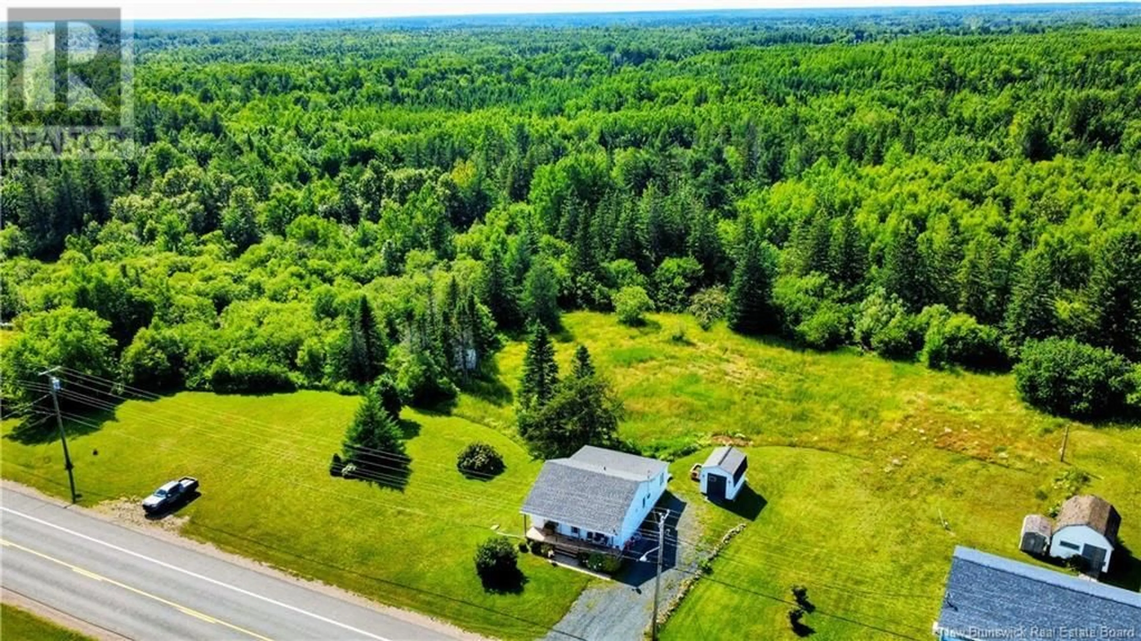 A pic from outside/outdoor area/front of a property/back of a property/a pic from drone, forest/trees view for 35 NB 325, Trudel New Brunswick E8R1N7